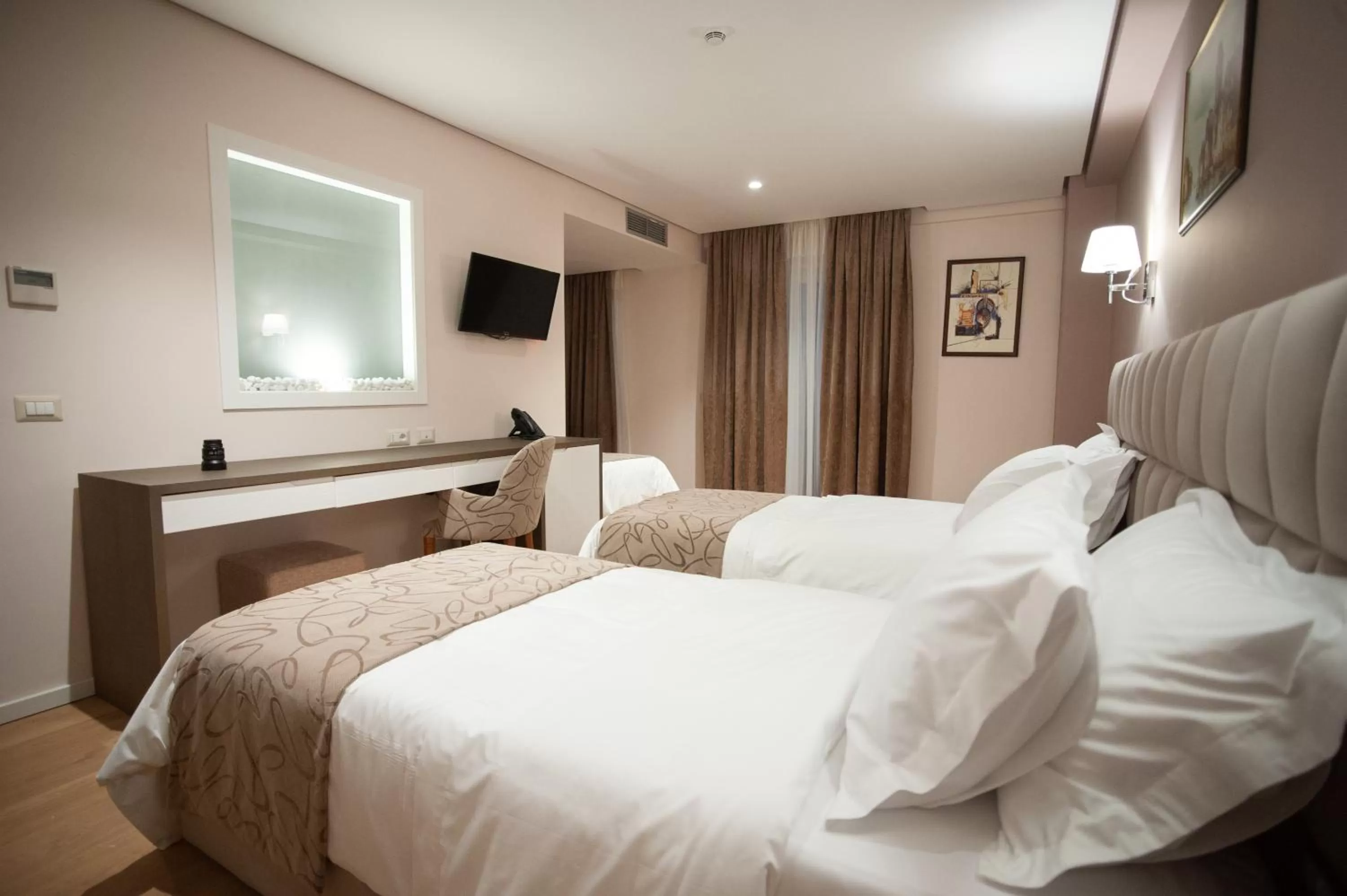 Bed in Doanesia Premium Hotel & Spa