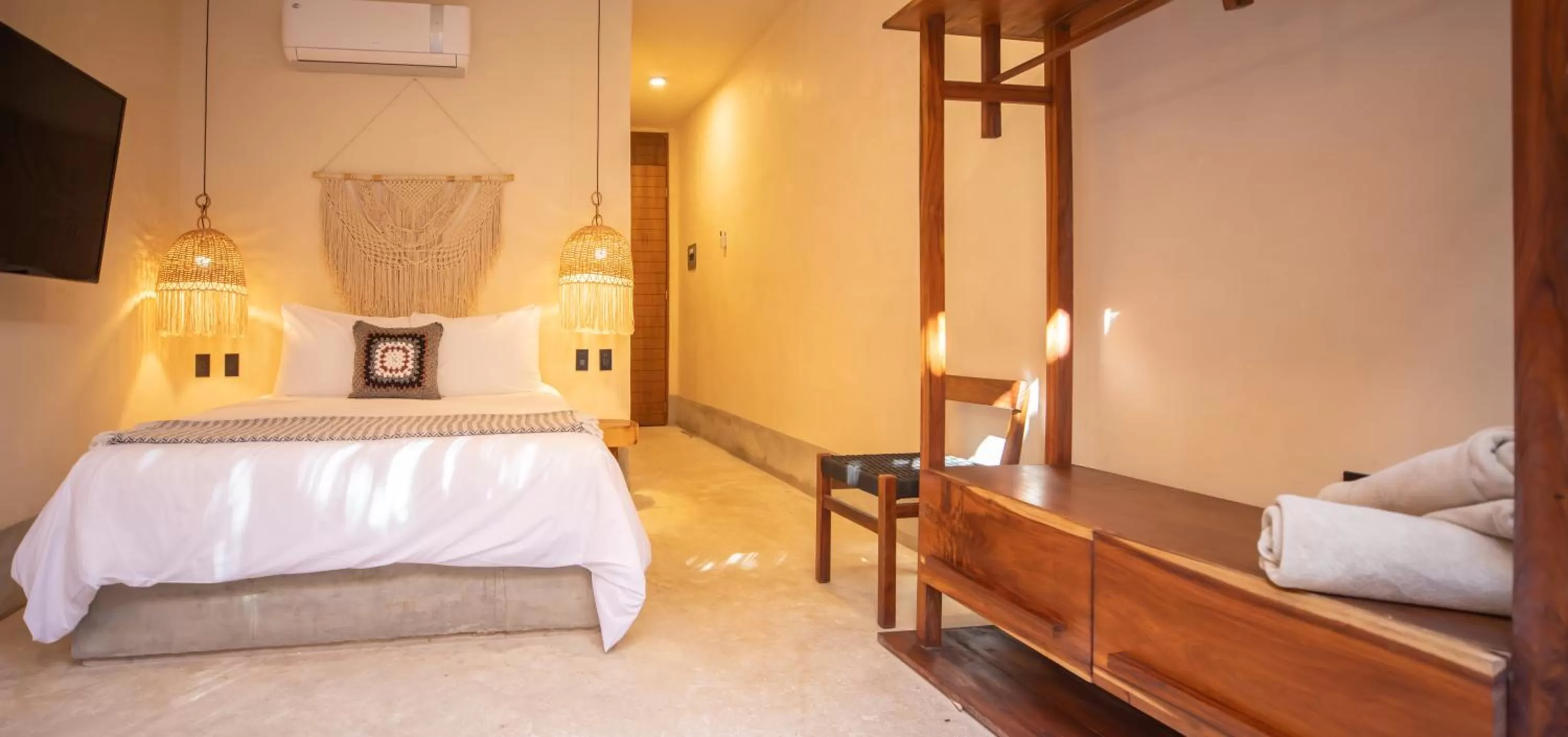 Photo of the whole room, Bed in Nuee Hotel & Beach Club