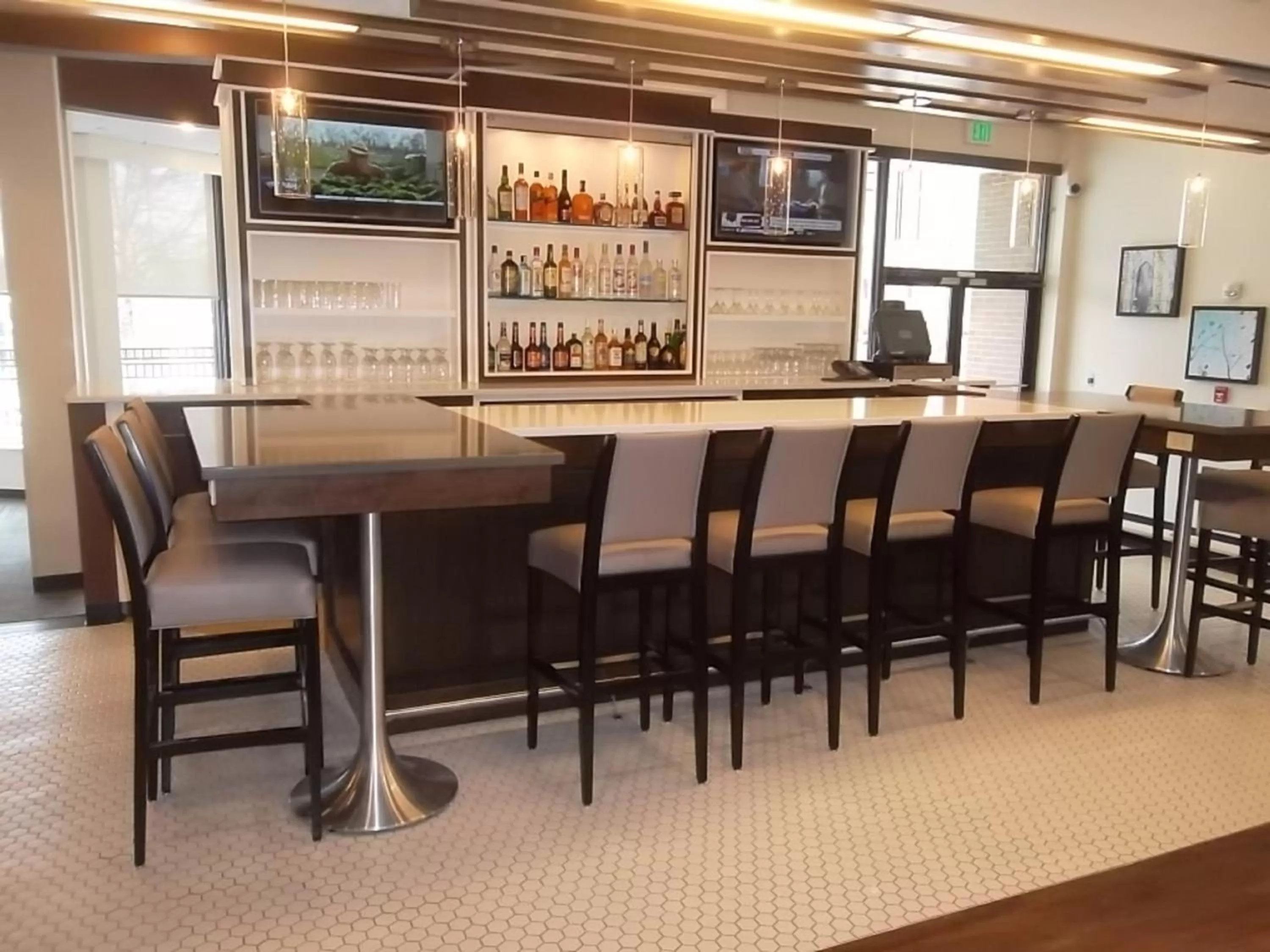 Lounge or bar in Holiday Inn Greensboro Coliseum by IHG