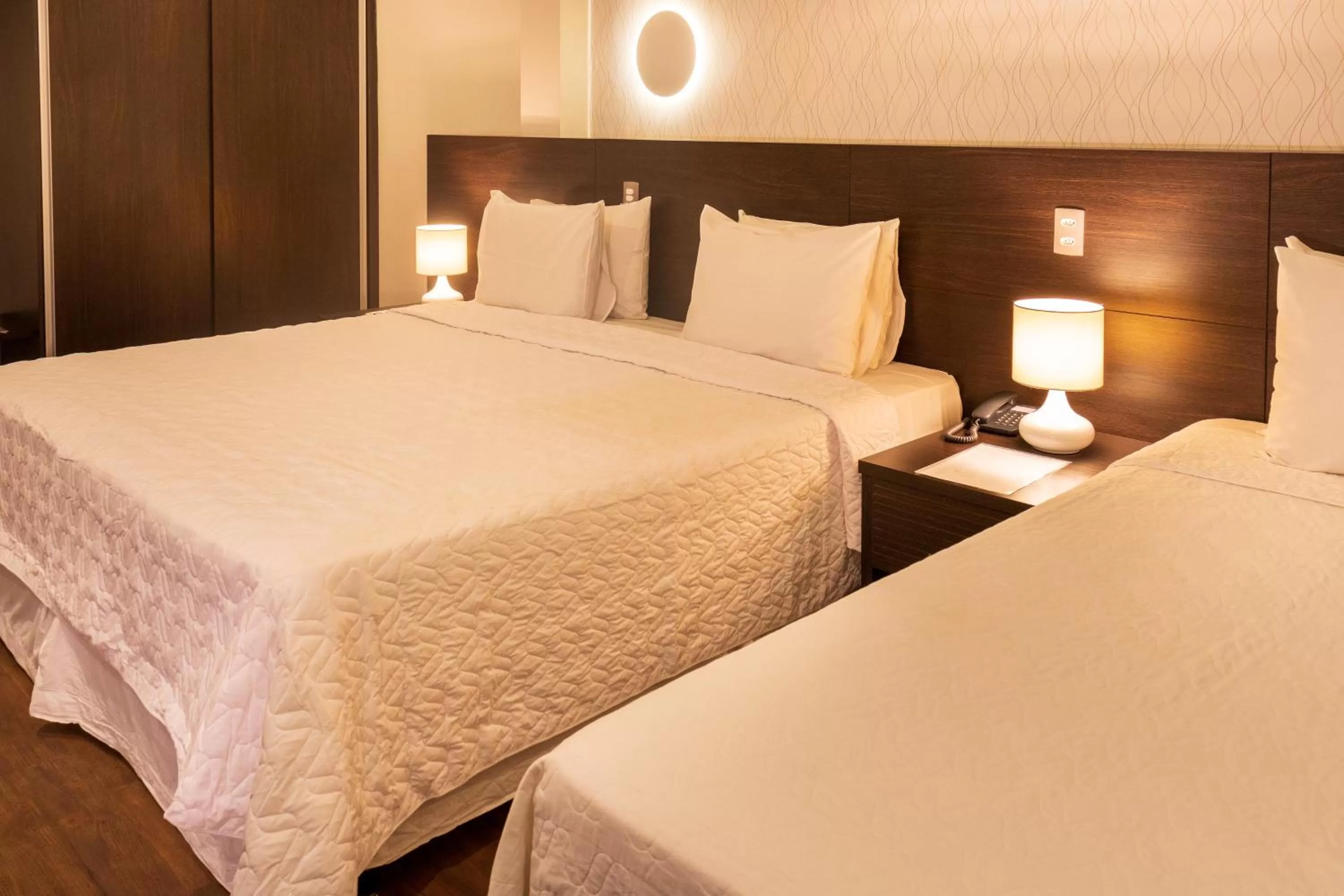 Bed in Arosa Rio Hotel