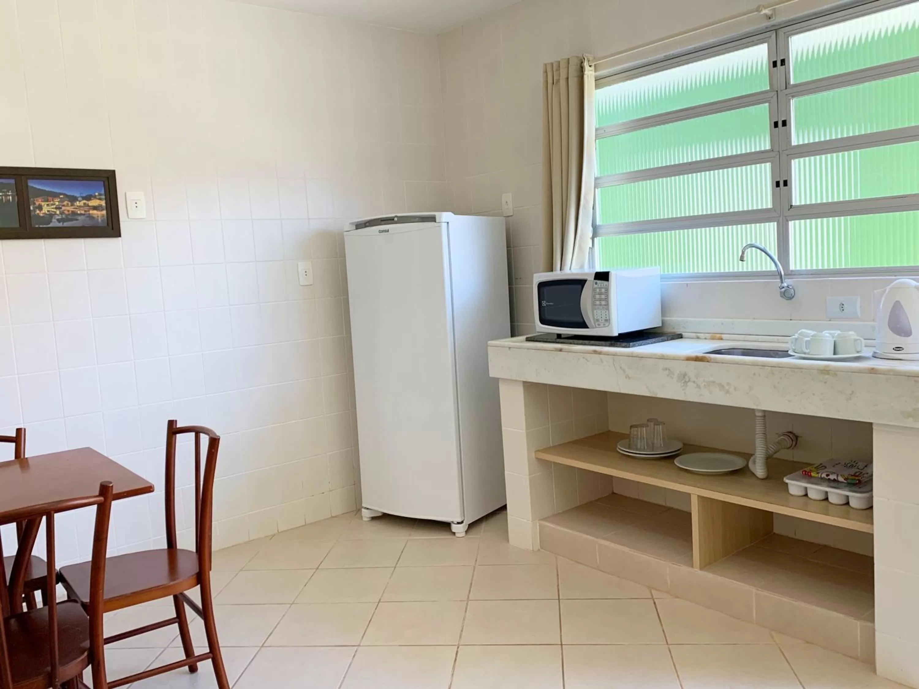 Kitchen or kitchenette in Pousada Mar Do Leste