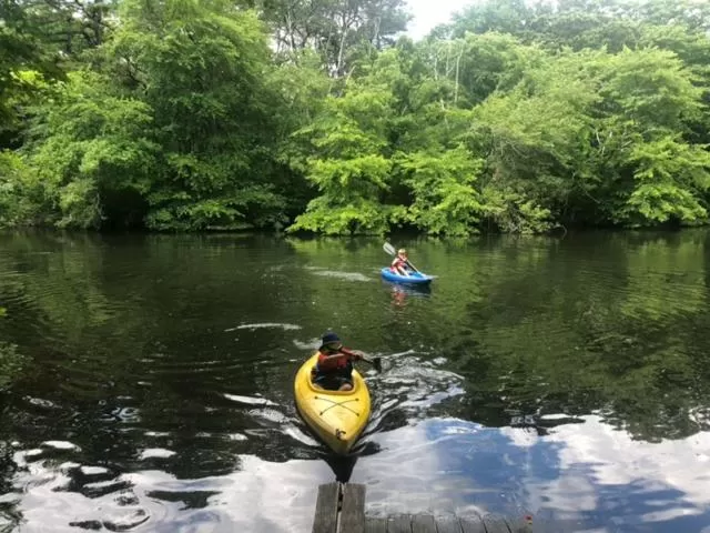 Day, Canoeing in Herring Run Motel and Tiny Cabins