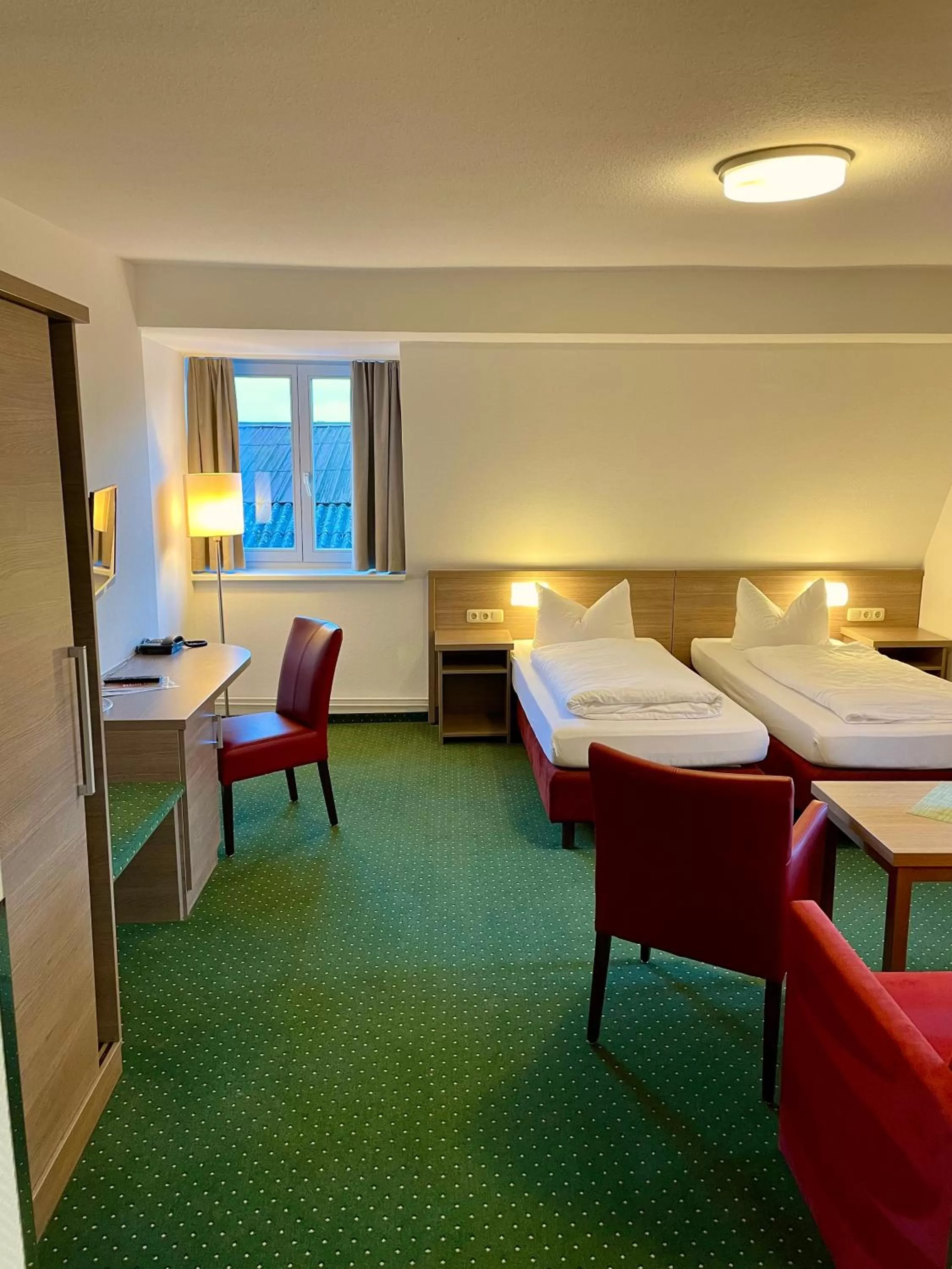 Photo of the whole room, Bed in Gasthof Scharfe Kurve