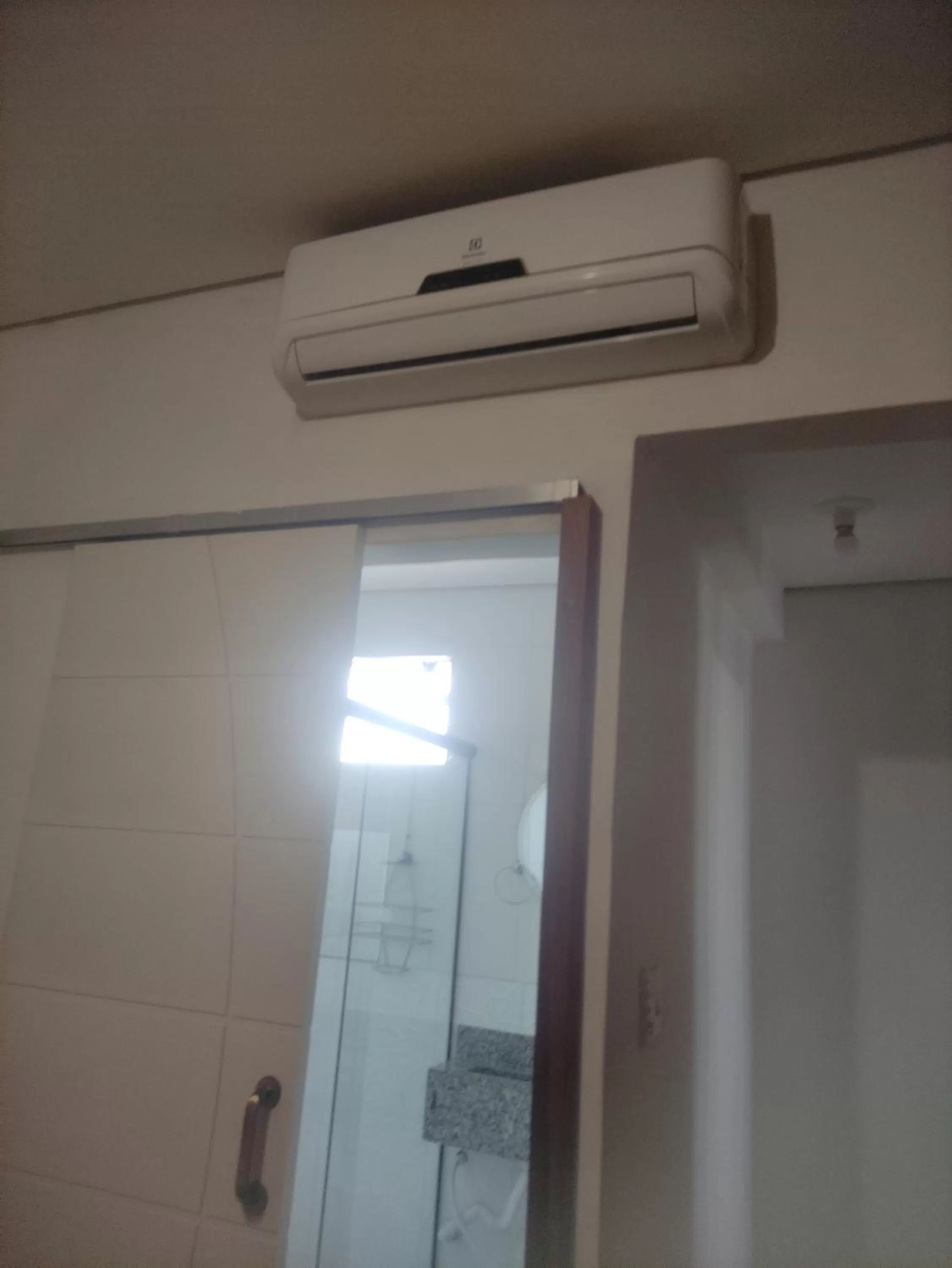 Bathroom in Pousada da Gi Suítes e Turismo