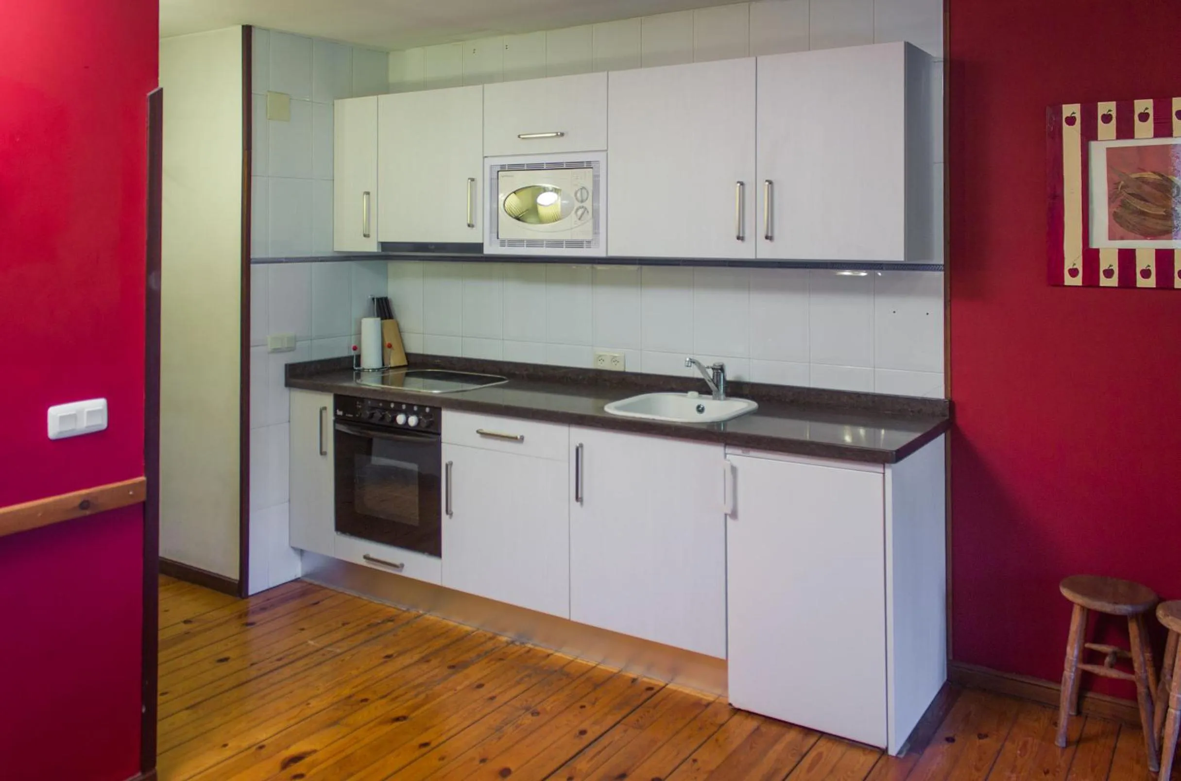 Kitchen or kitchenette in Viviendas Rurales El Covaju