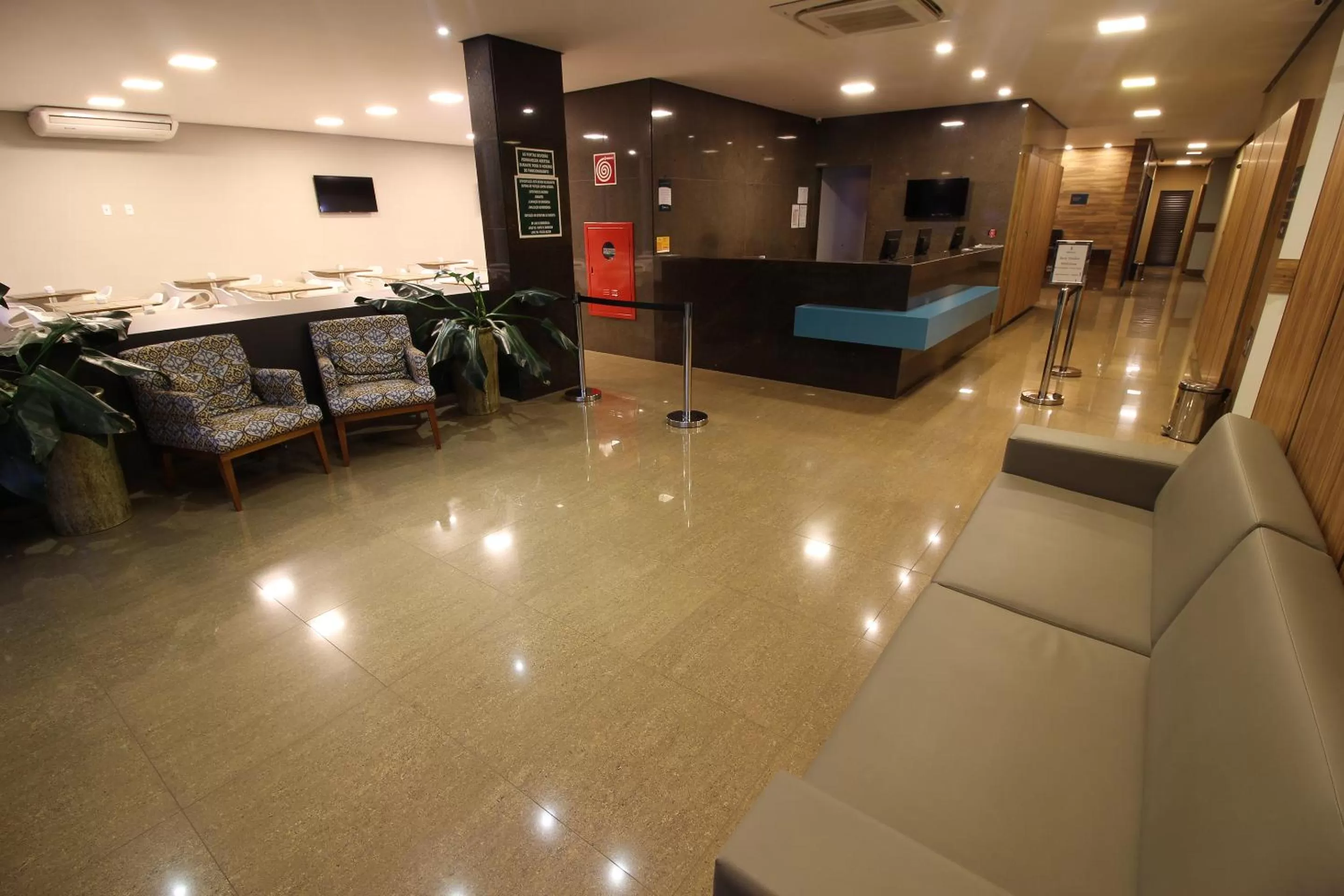 Lobby or reception in Impar Suites Barao de Cocais