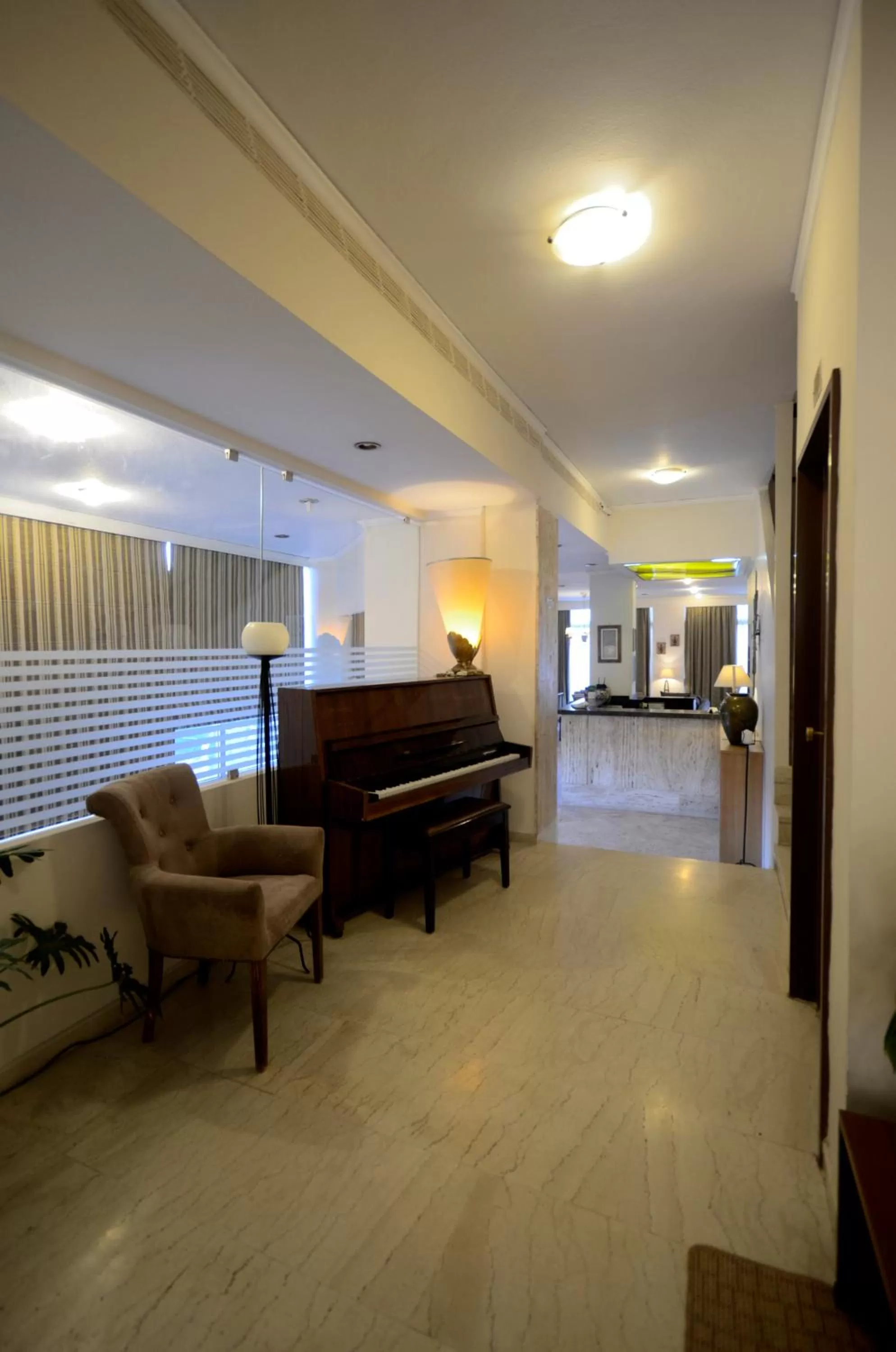 Communal lounge/ TV room, Lobby/Reception in Messini Hotel