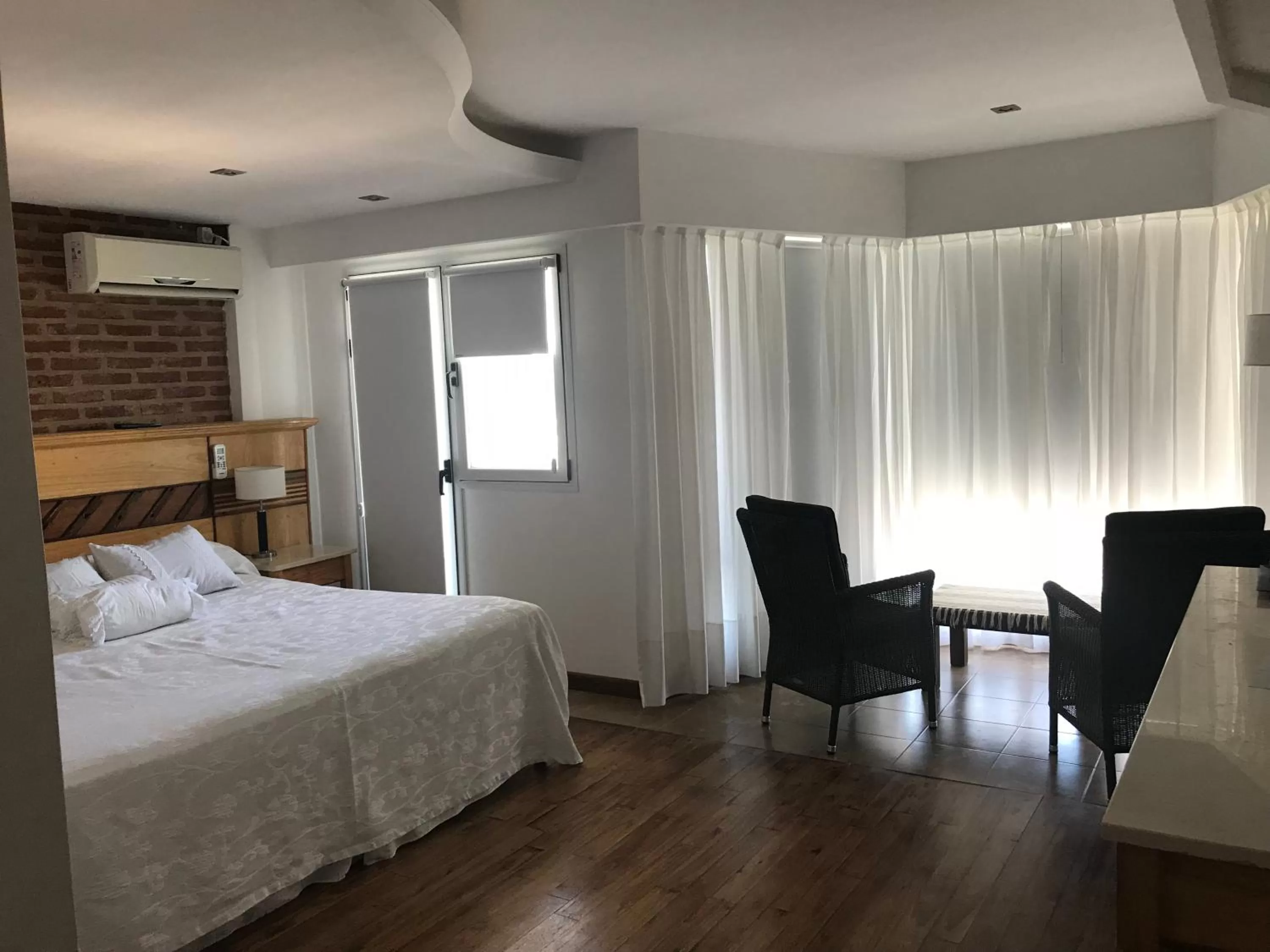 Bed in Costanera Mar Hotel & Suites