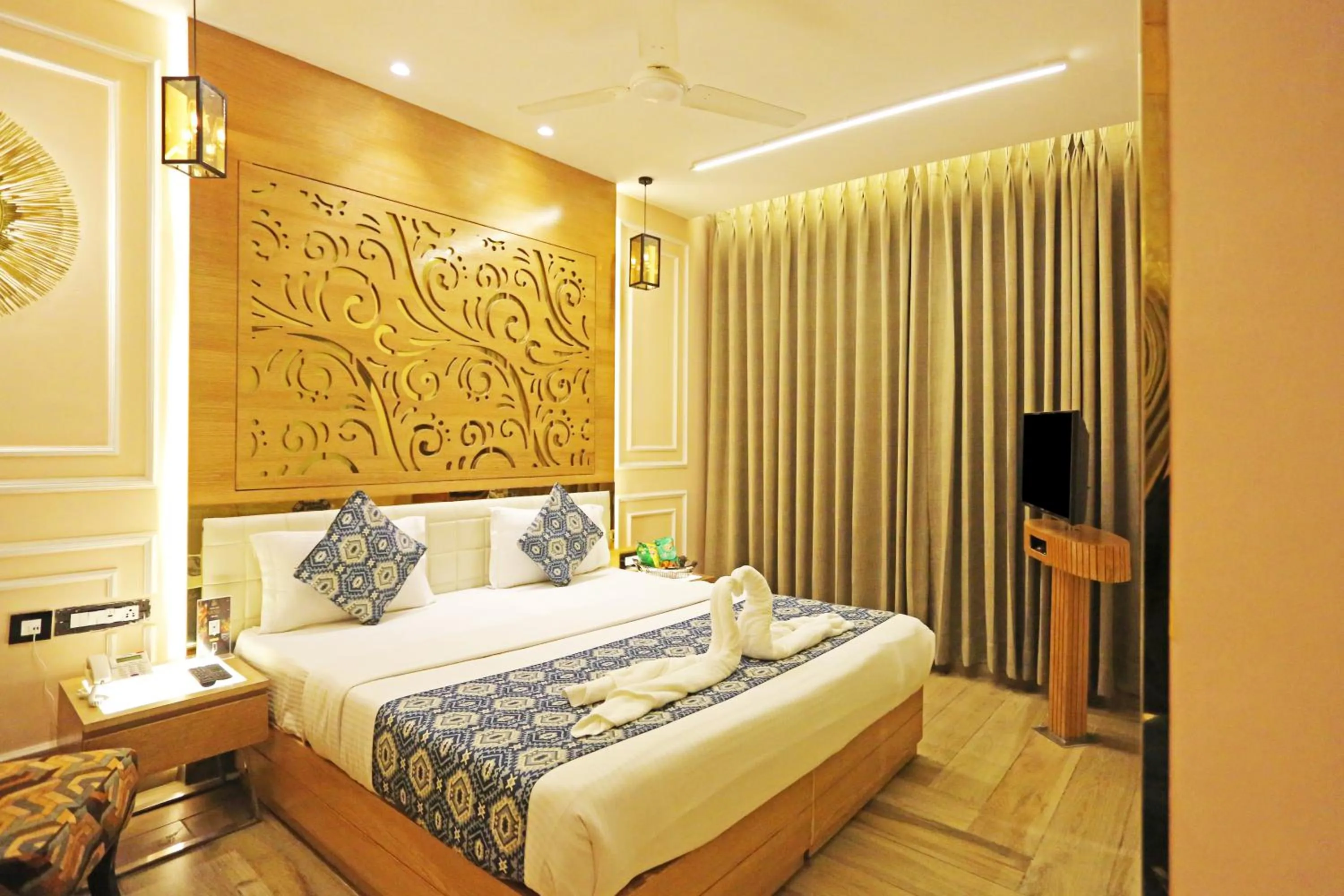 Bed in JRD Luxury-Business Hotel
