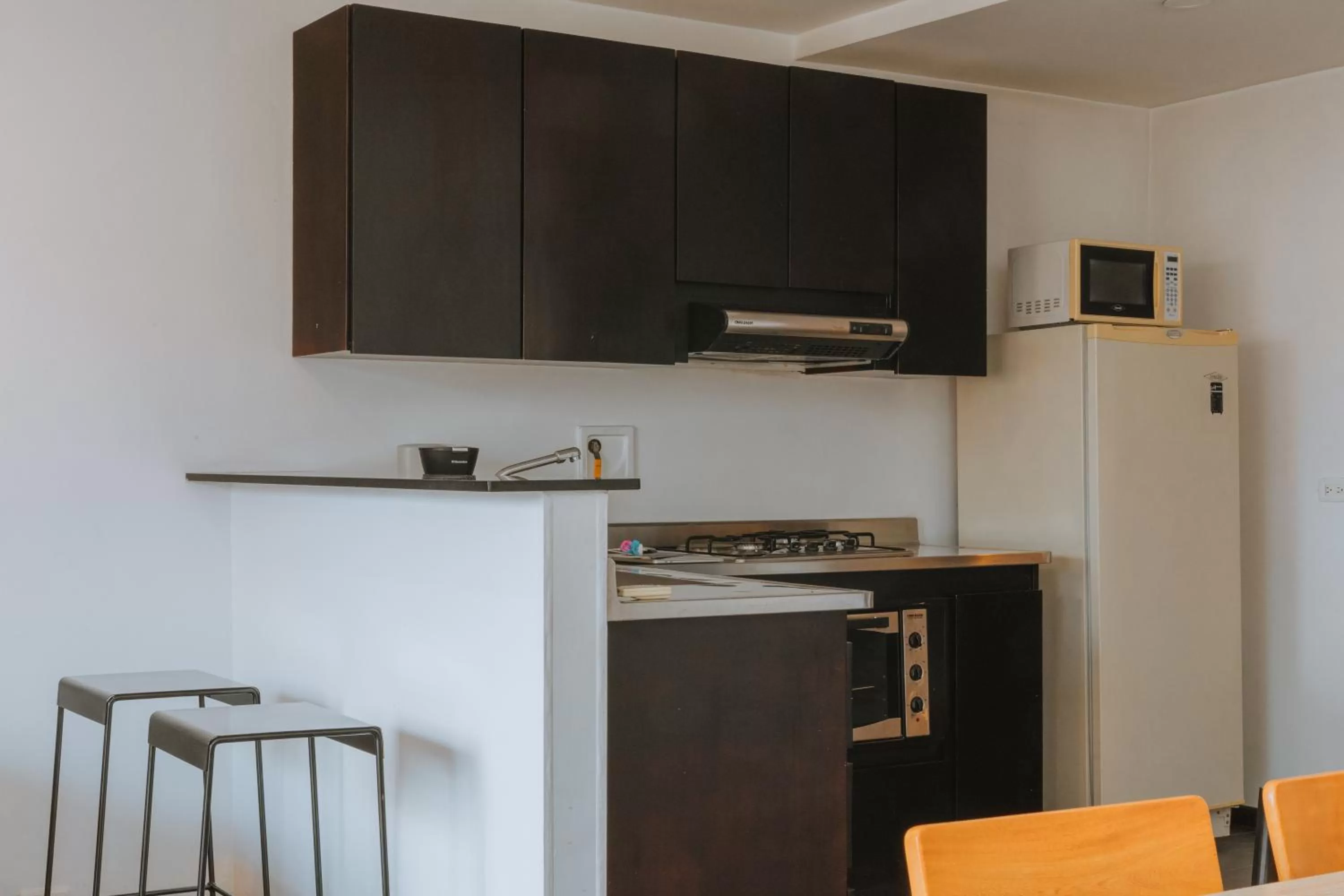 Kitchen or kitchenette in Travelers Orange Suites