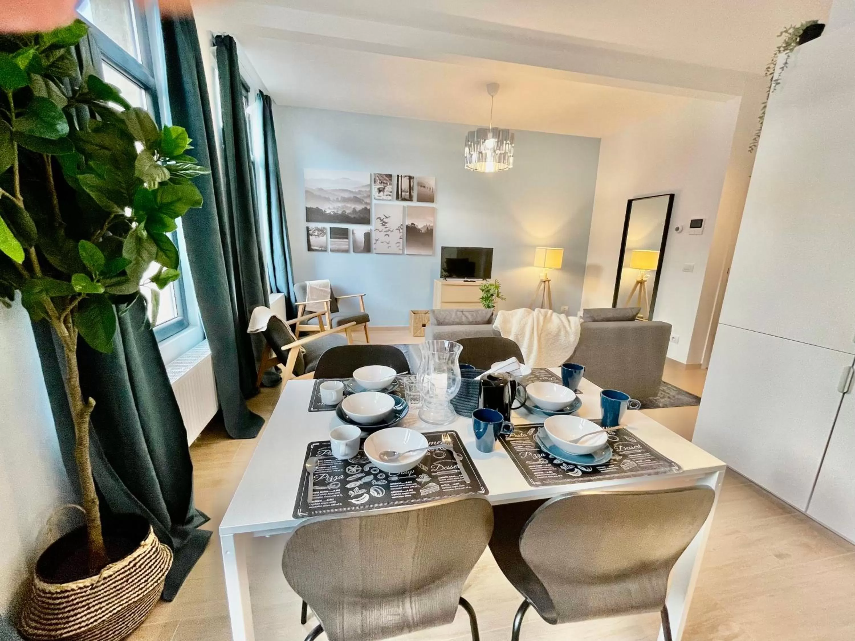 Dining area in OneLuxStay near Fashion District