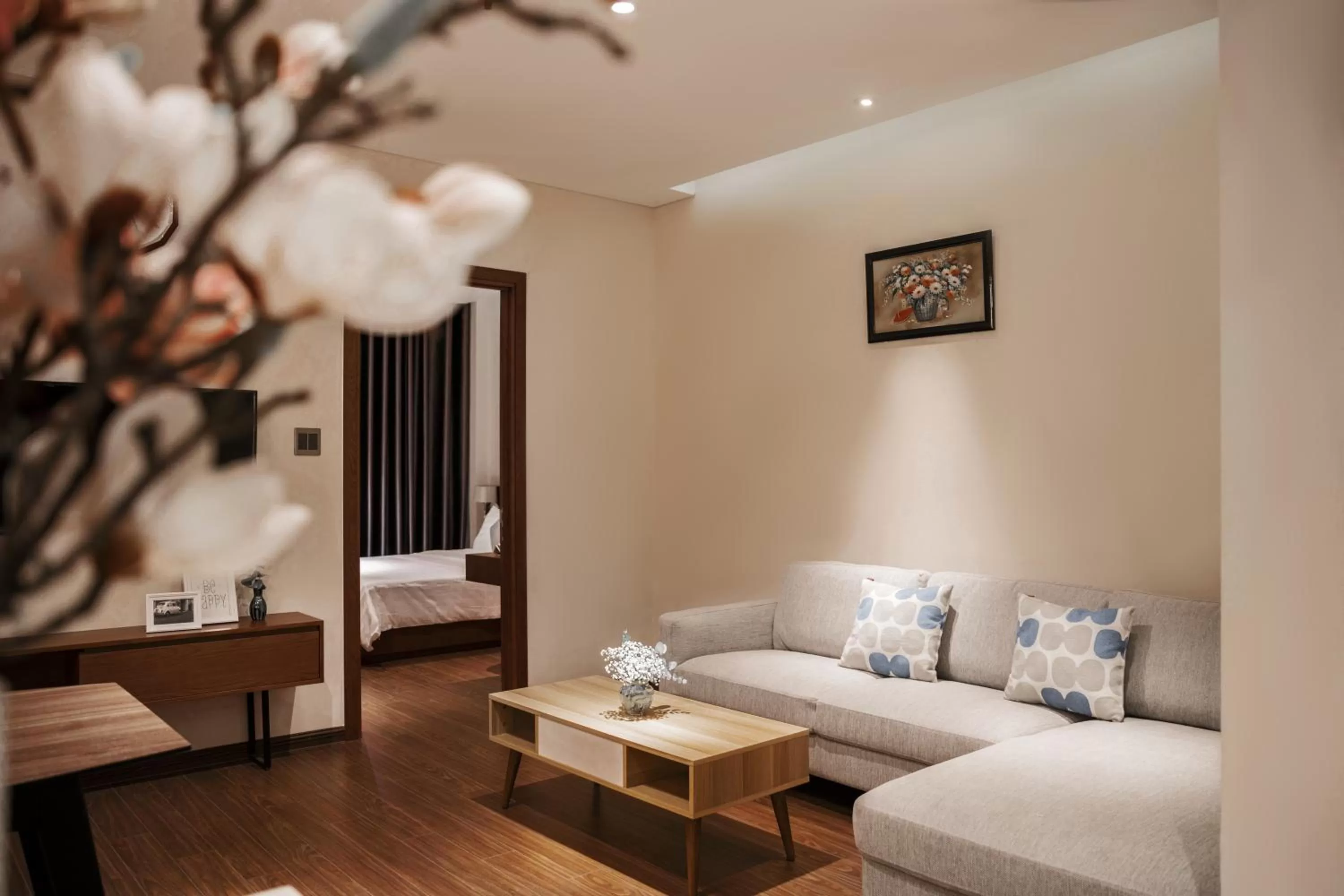 Living room, Bed in DHTS Business Hotel & Apartment