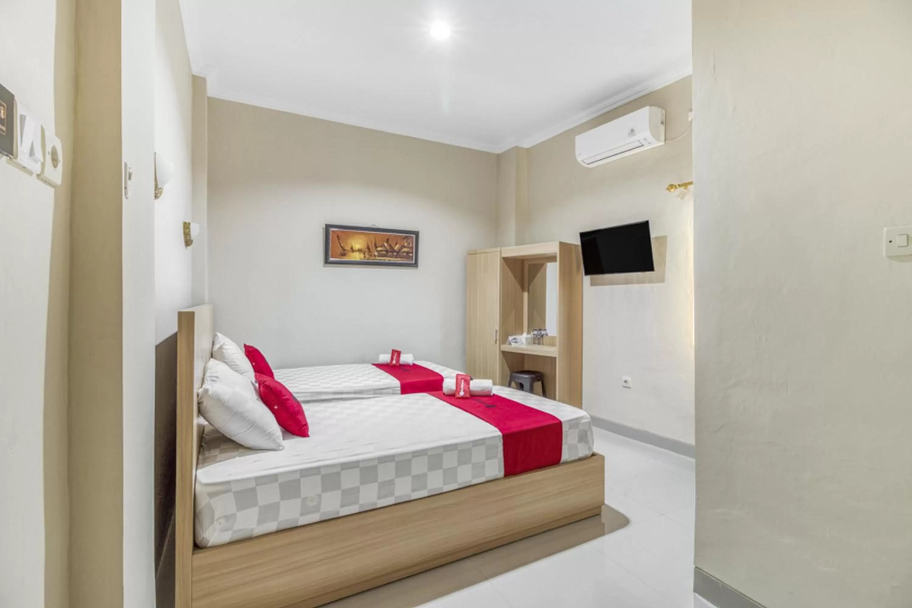 Bed in RedDoorz near Jogja National Museum