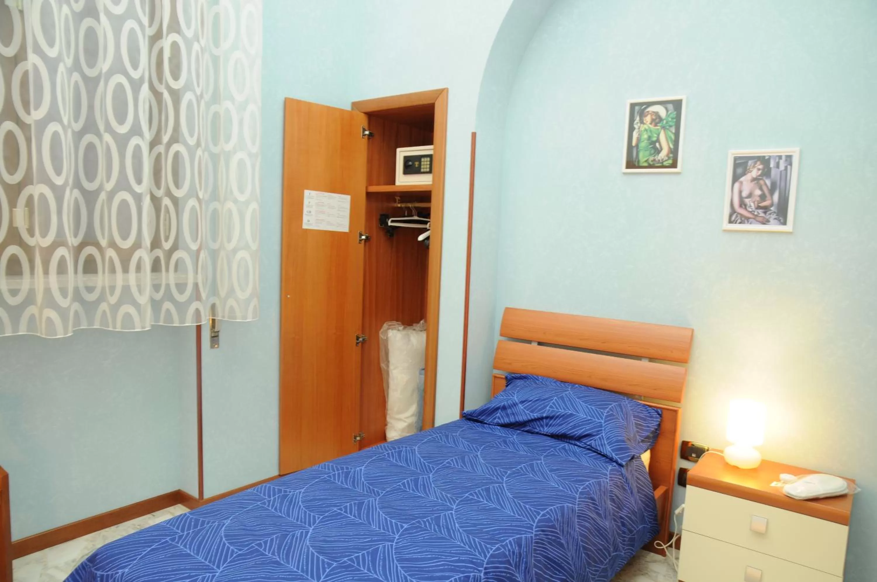 Bed in Affittacamere Conte Di Cavour