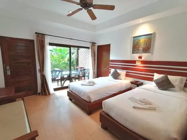 Bed in Green View Village Resort