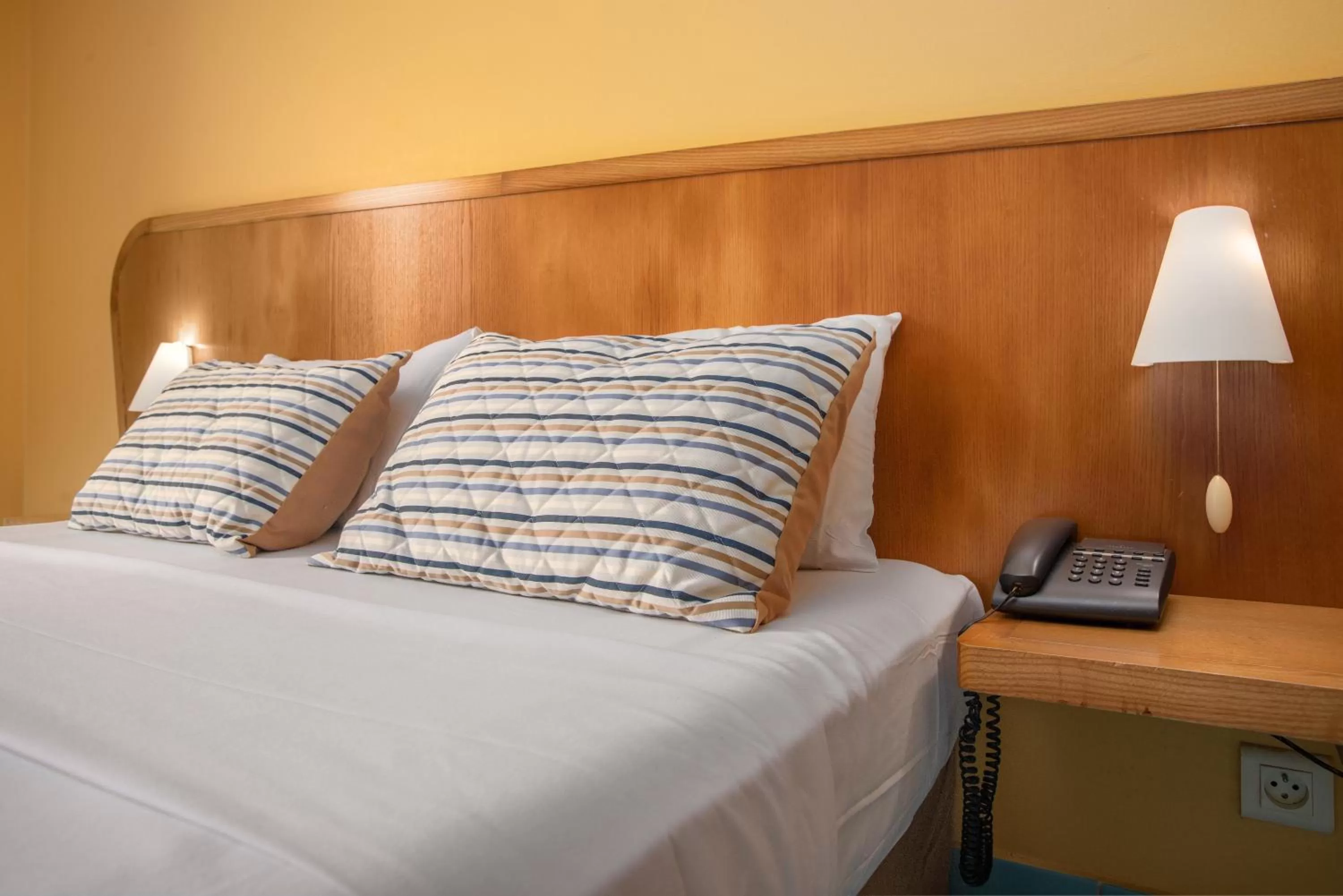 Bed in Zenitude Hôtel Résidences Le Salako