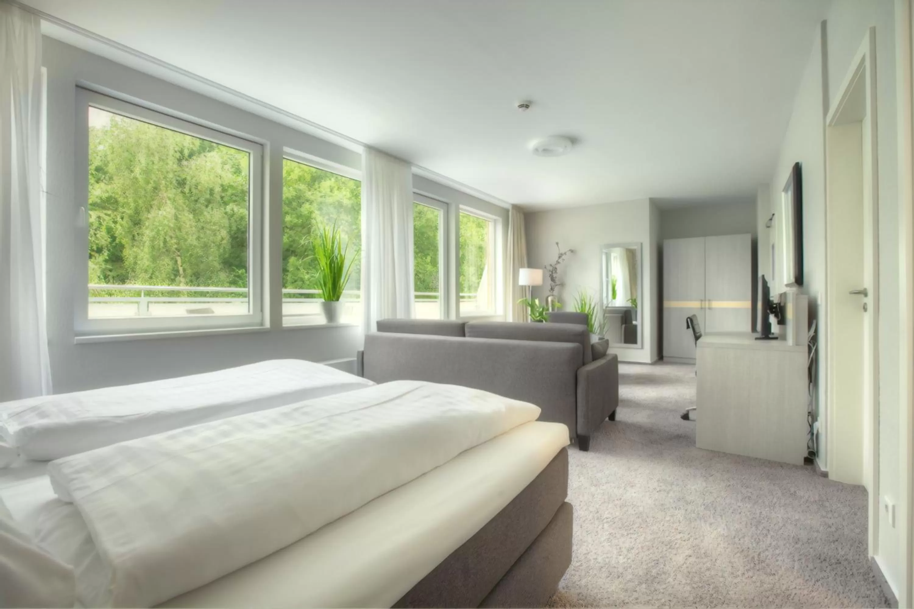 Living room, Bed in Hotel des Nordens Flensburg Wellness & Spa