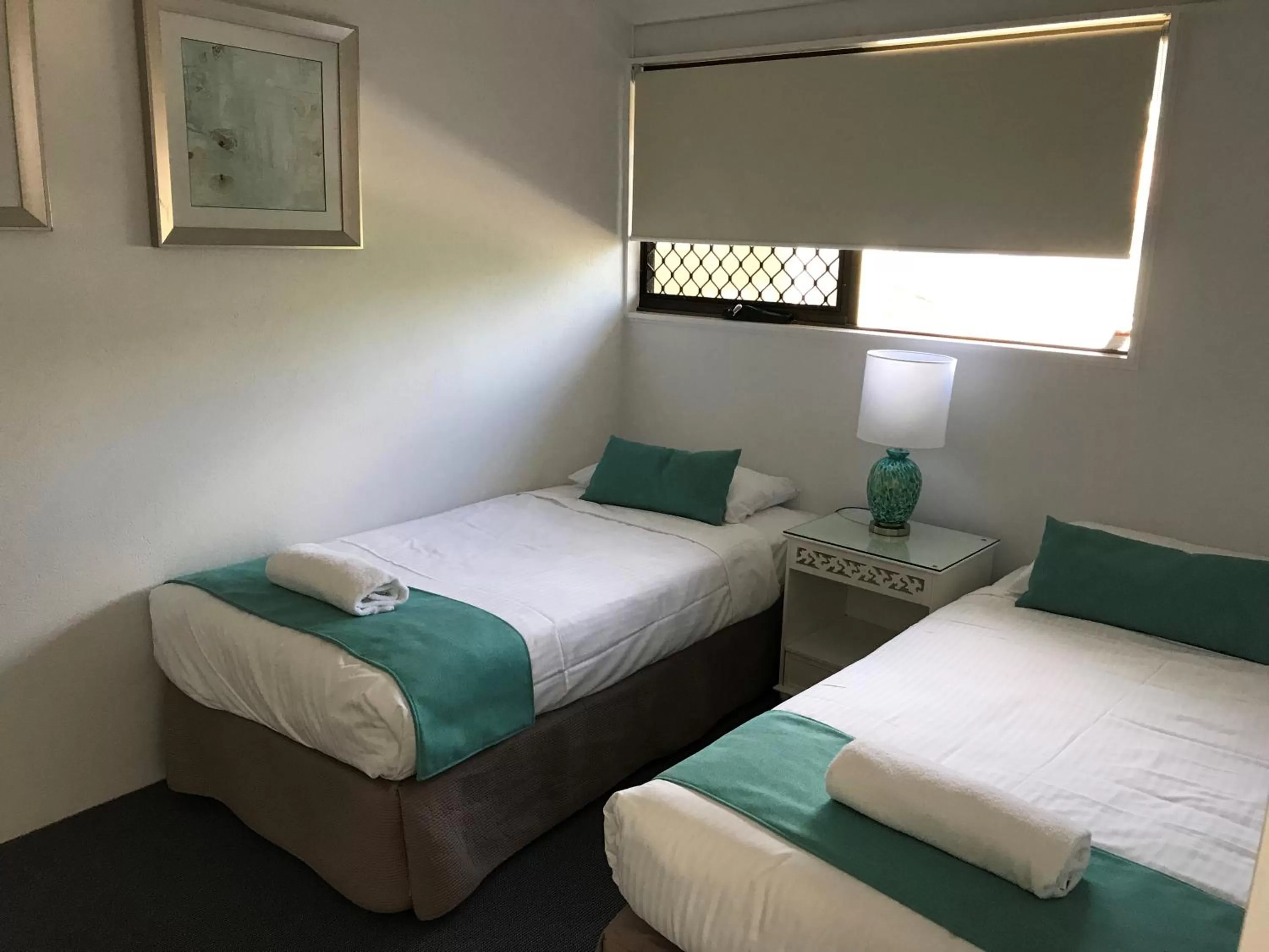 Bed in Glen Eden Beach Resort