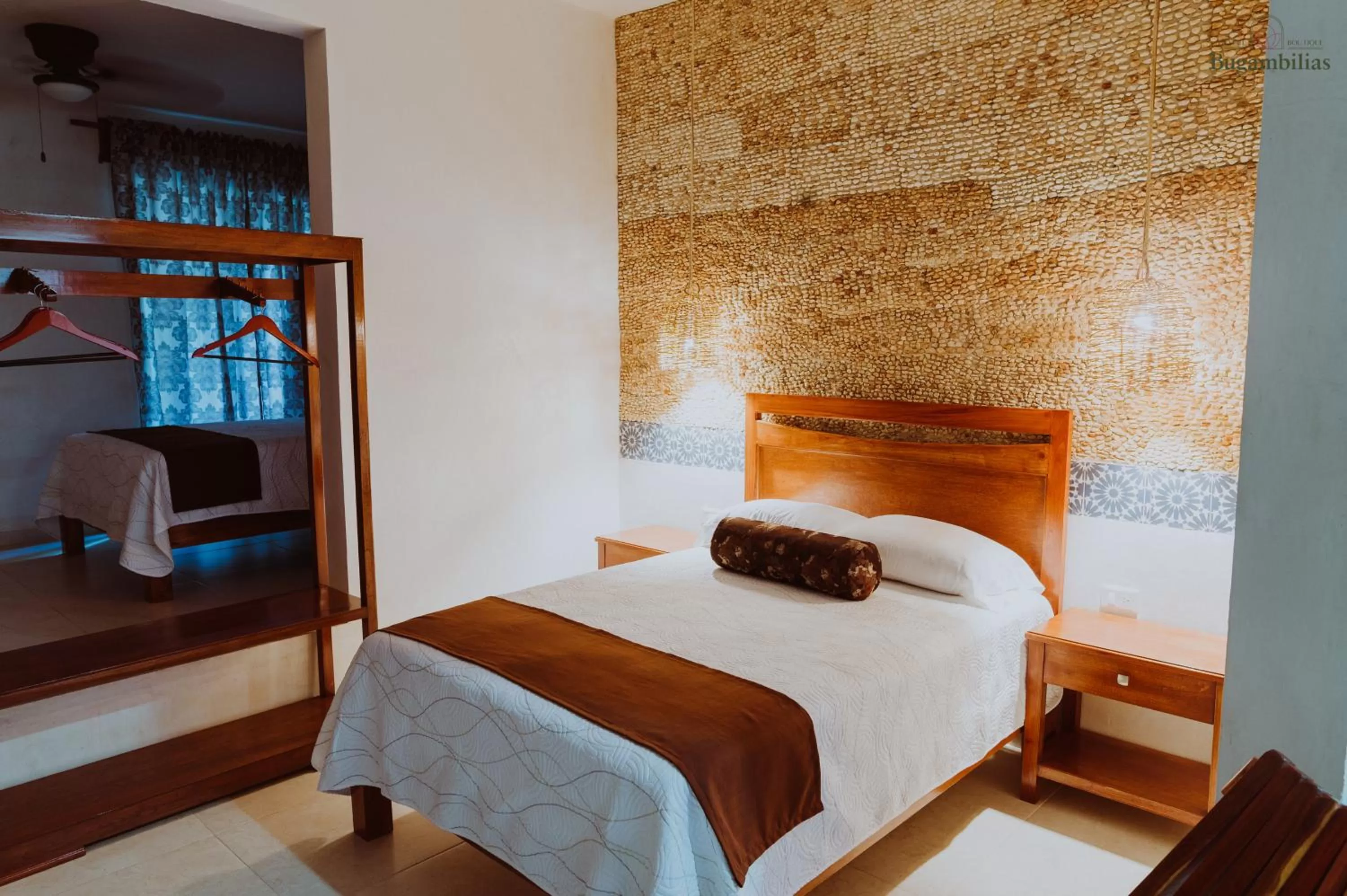 Bed in Hotel Boutique Bugambilias