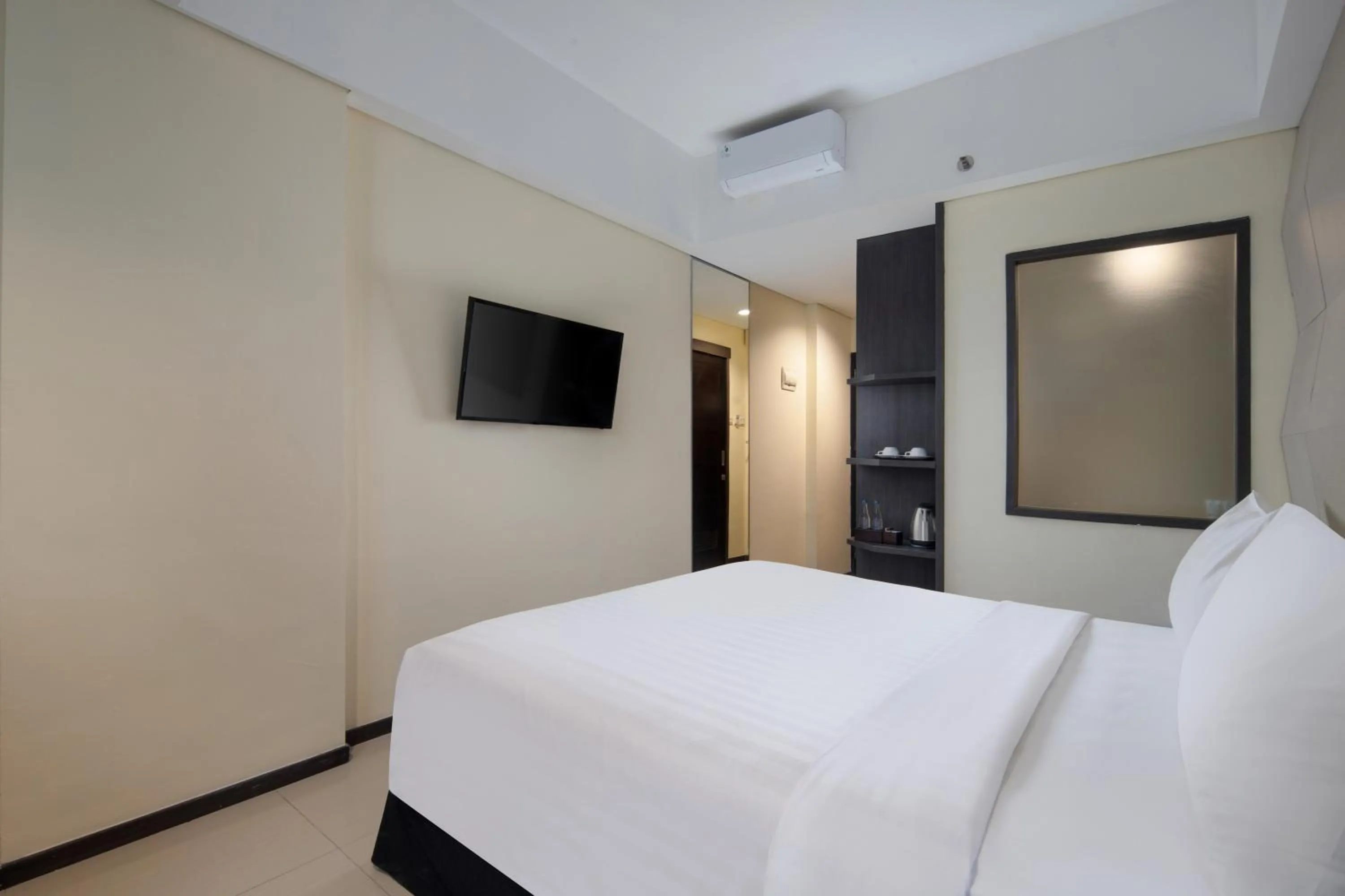 Bed in Fashion Hotel Legian
