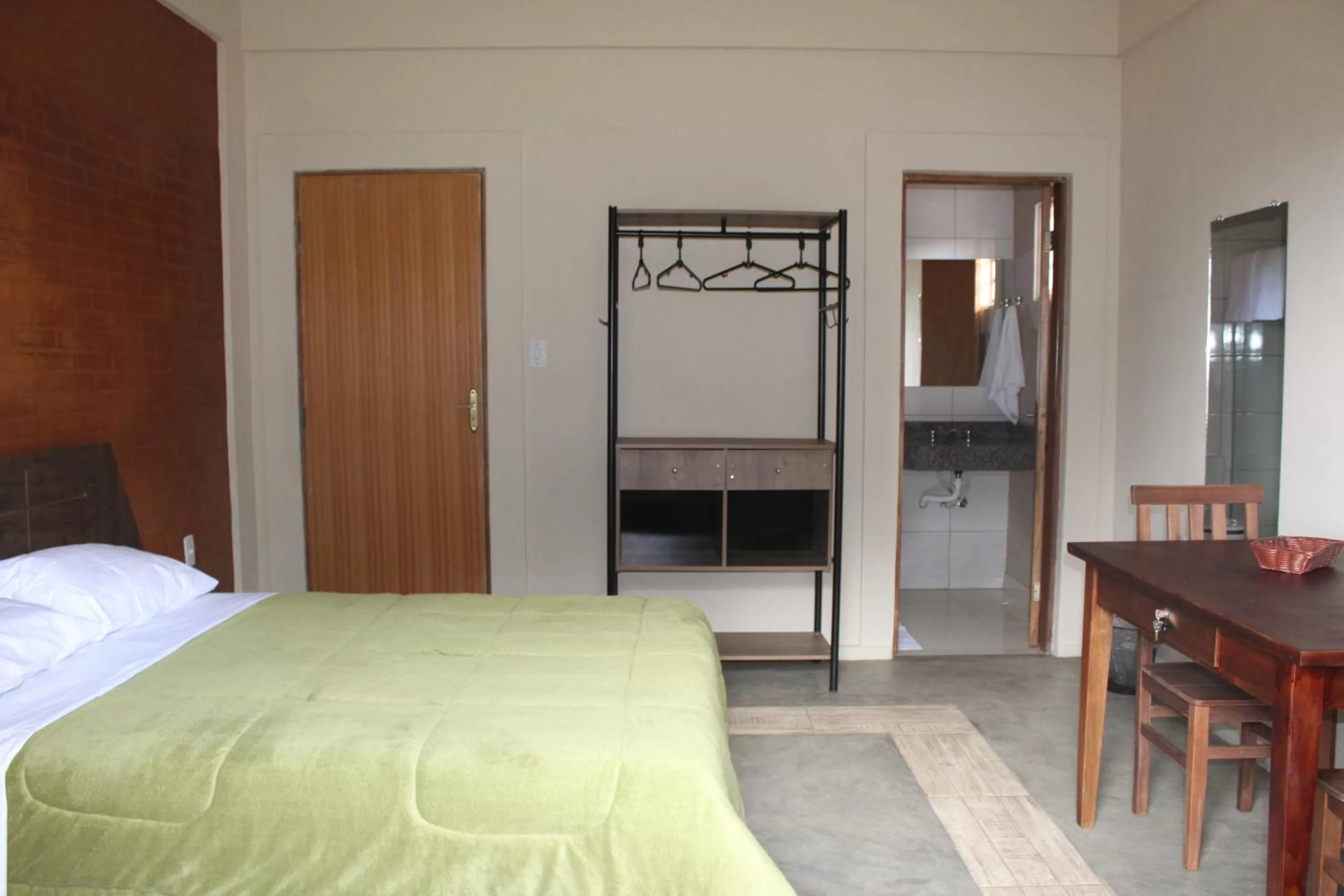 Bed in Pousada Morro dos Ventos