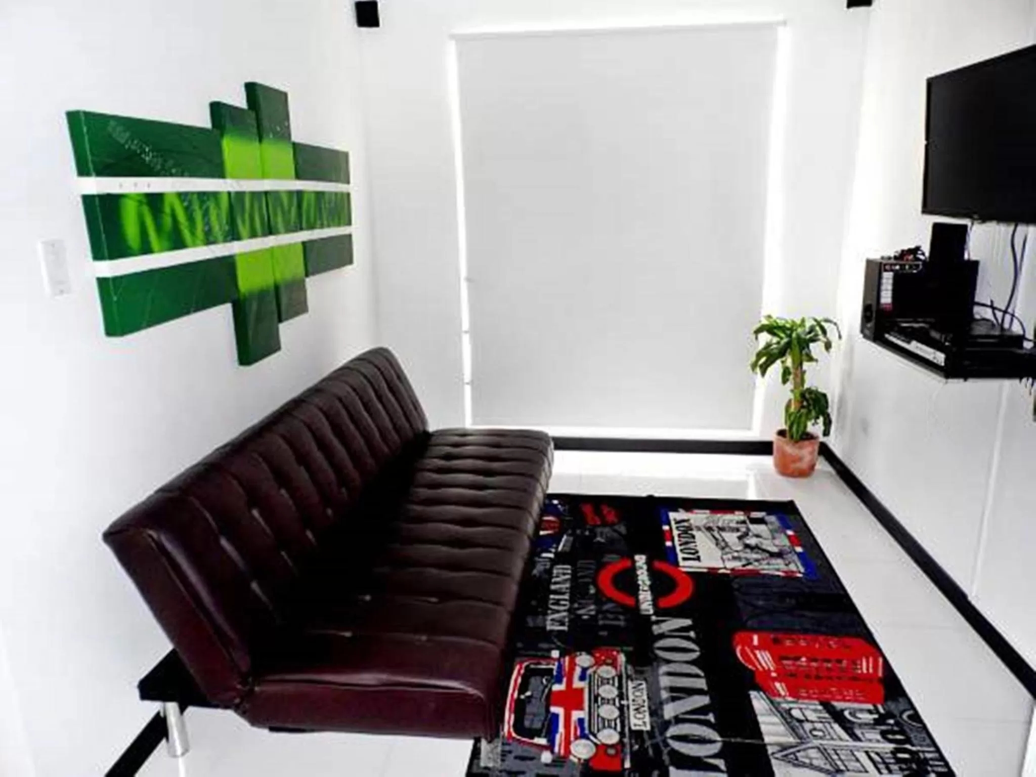 Living room in Apartasuites San Marcos