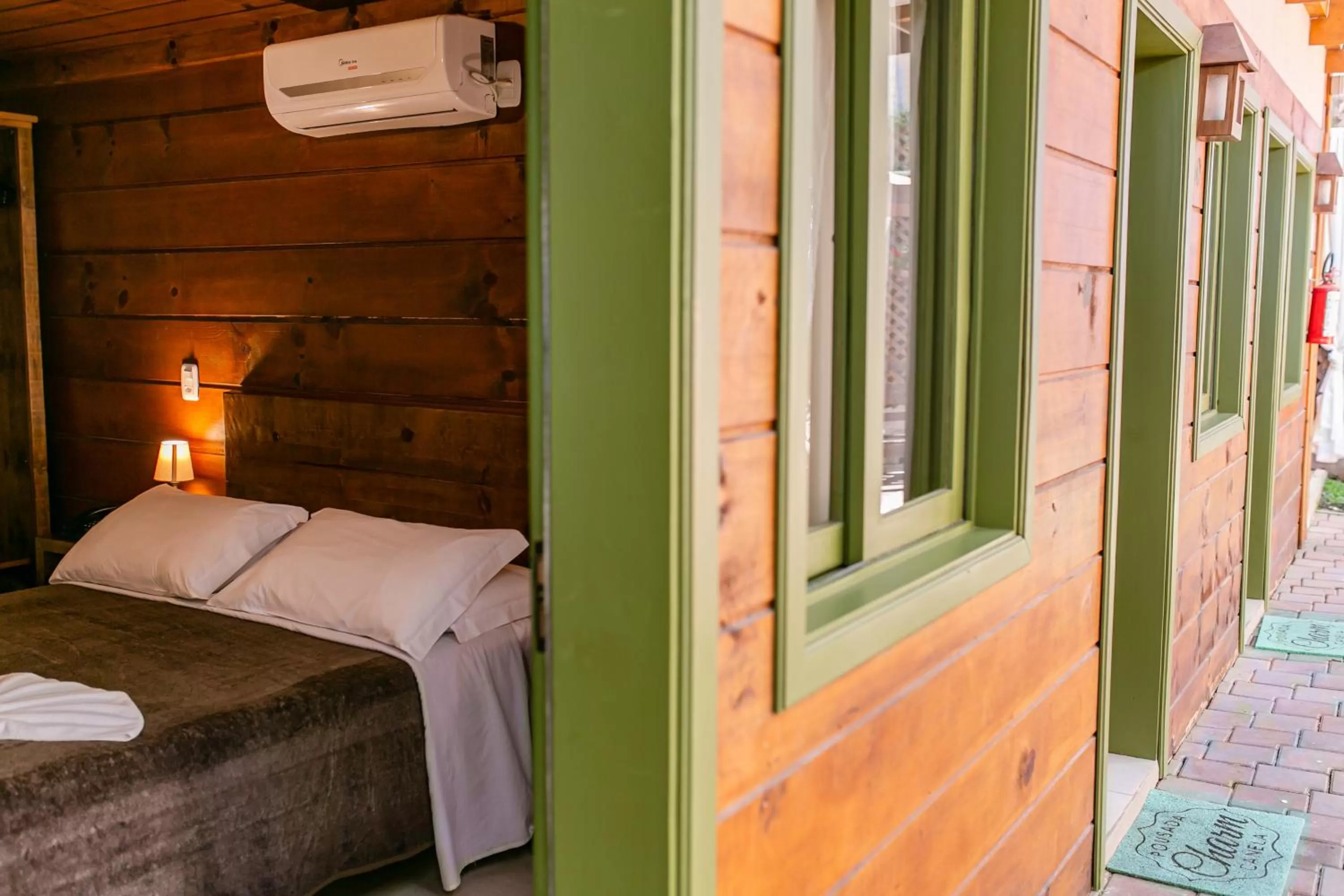 Bed in Pousada Charm Canela