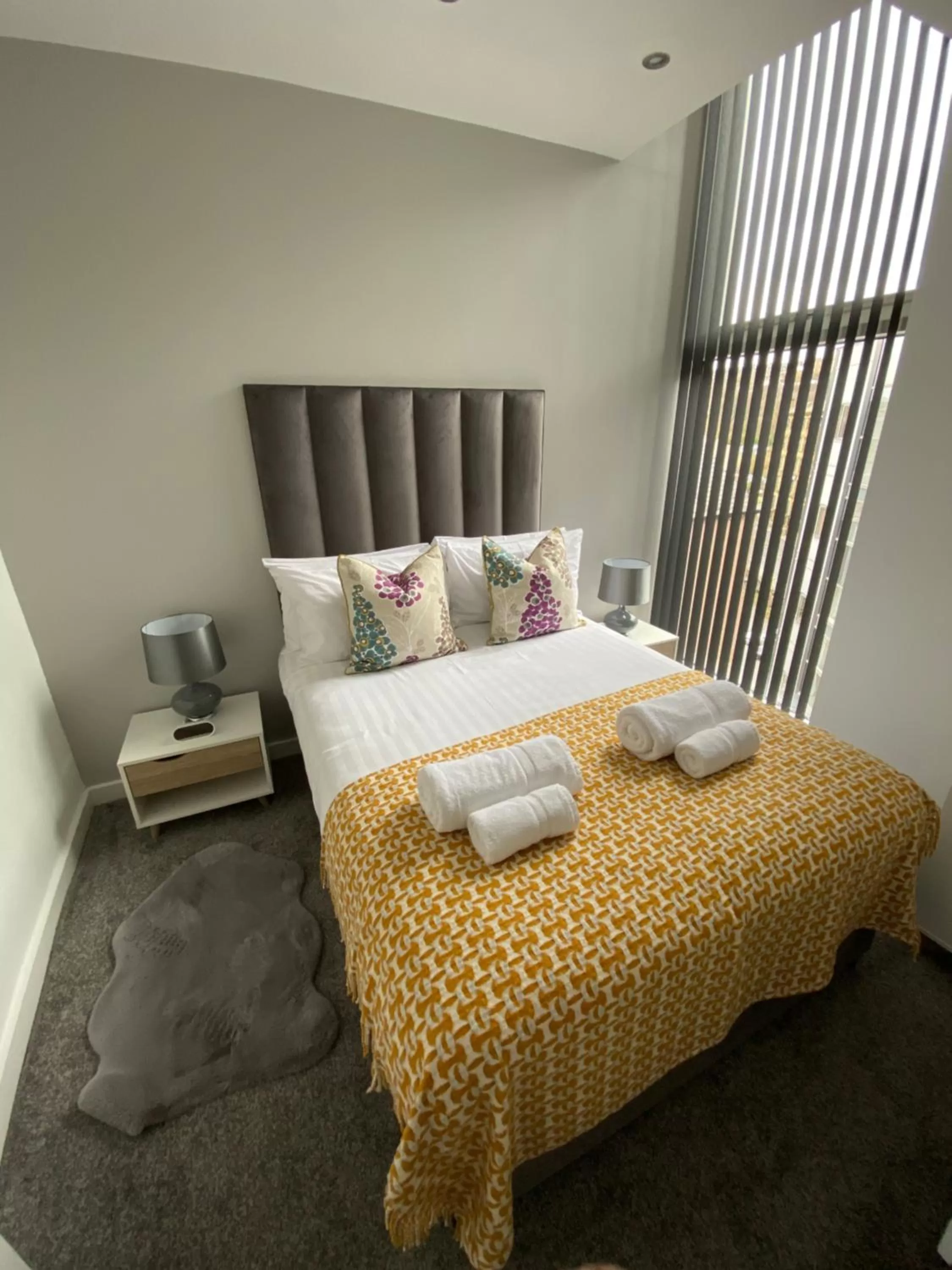 Bed in Spire Accommodations Ltd