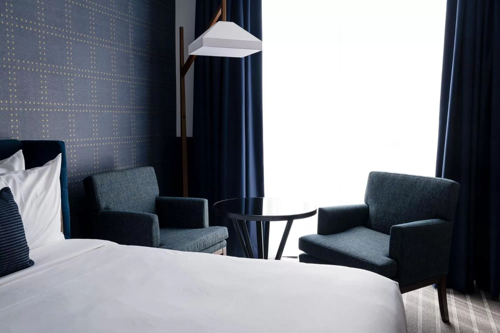 Seating area, Bed in Cambria Hotel Boston Somerville