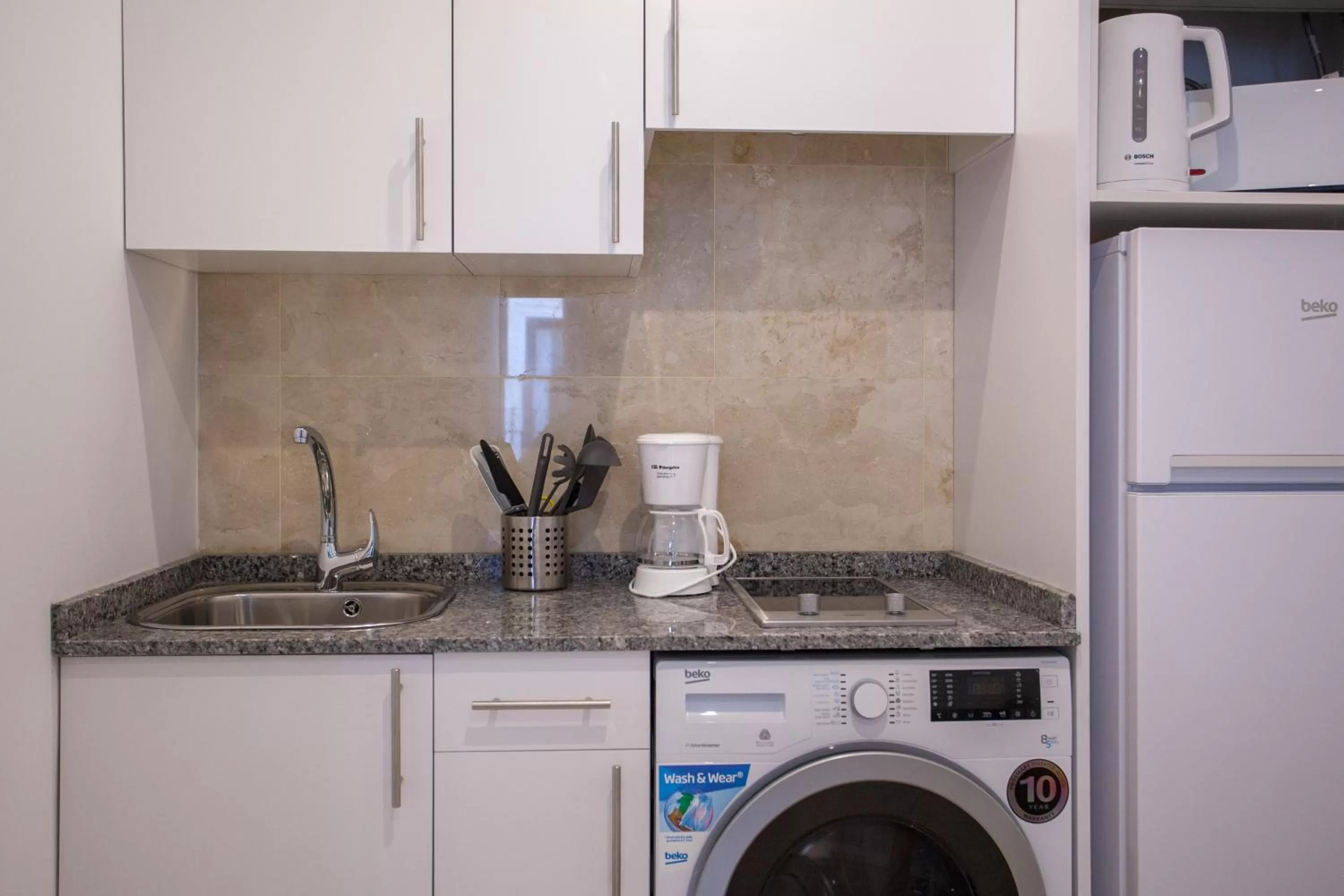 Kitchen or kitchenette in Gran Central Suites