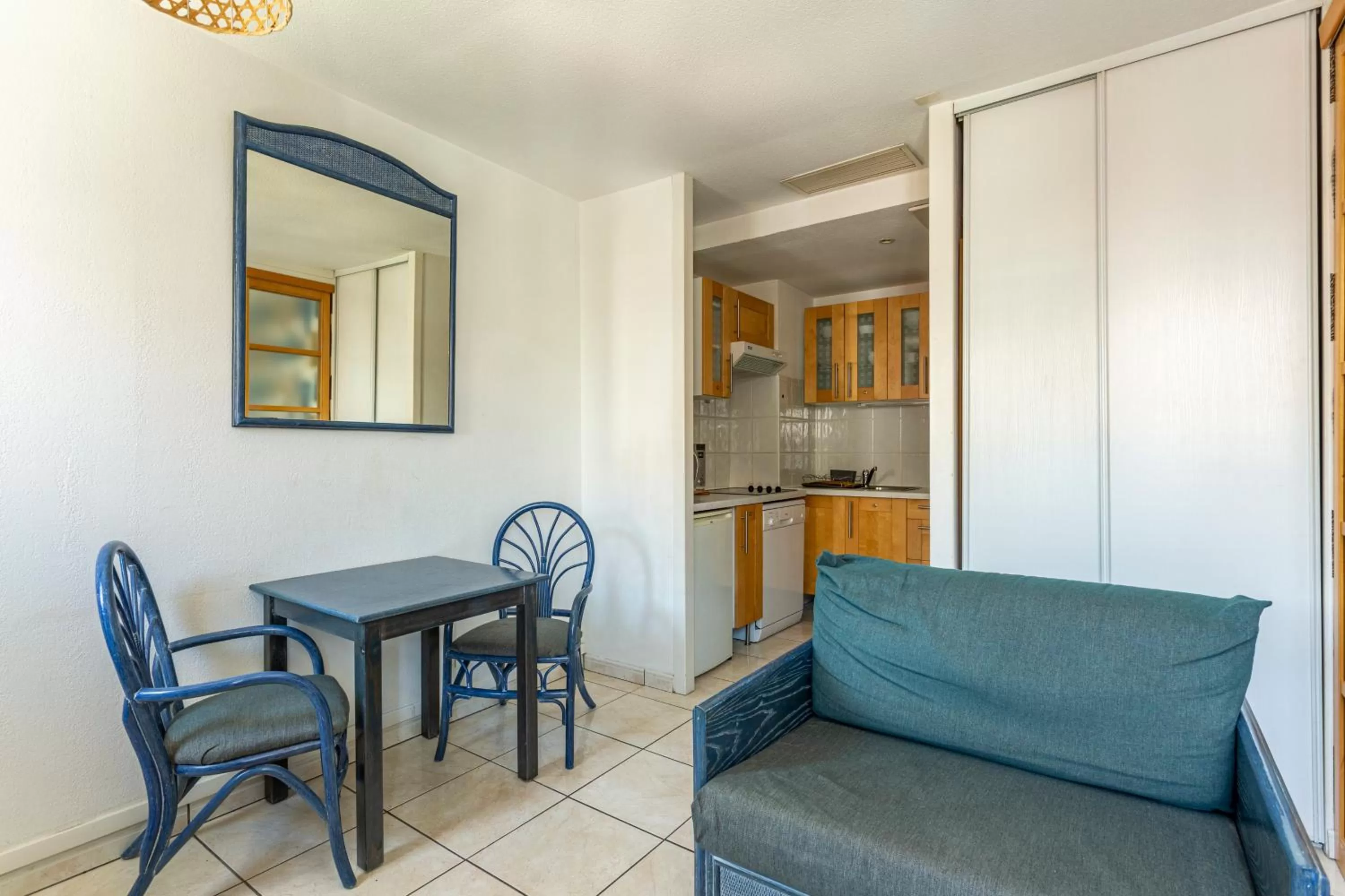 Kitchen or kitchenette in Hôtel & Appart-hôtel Olatua