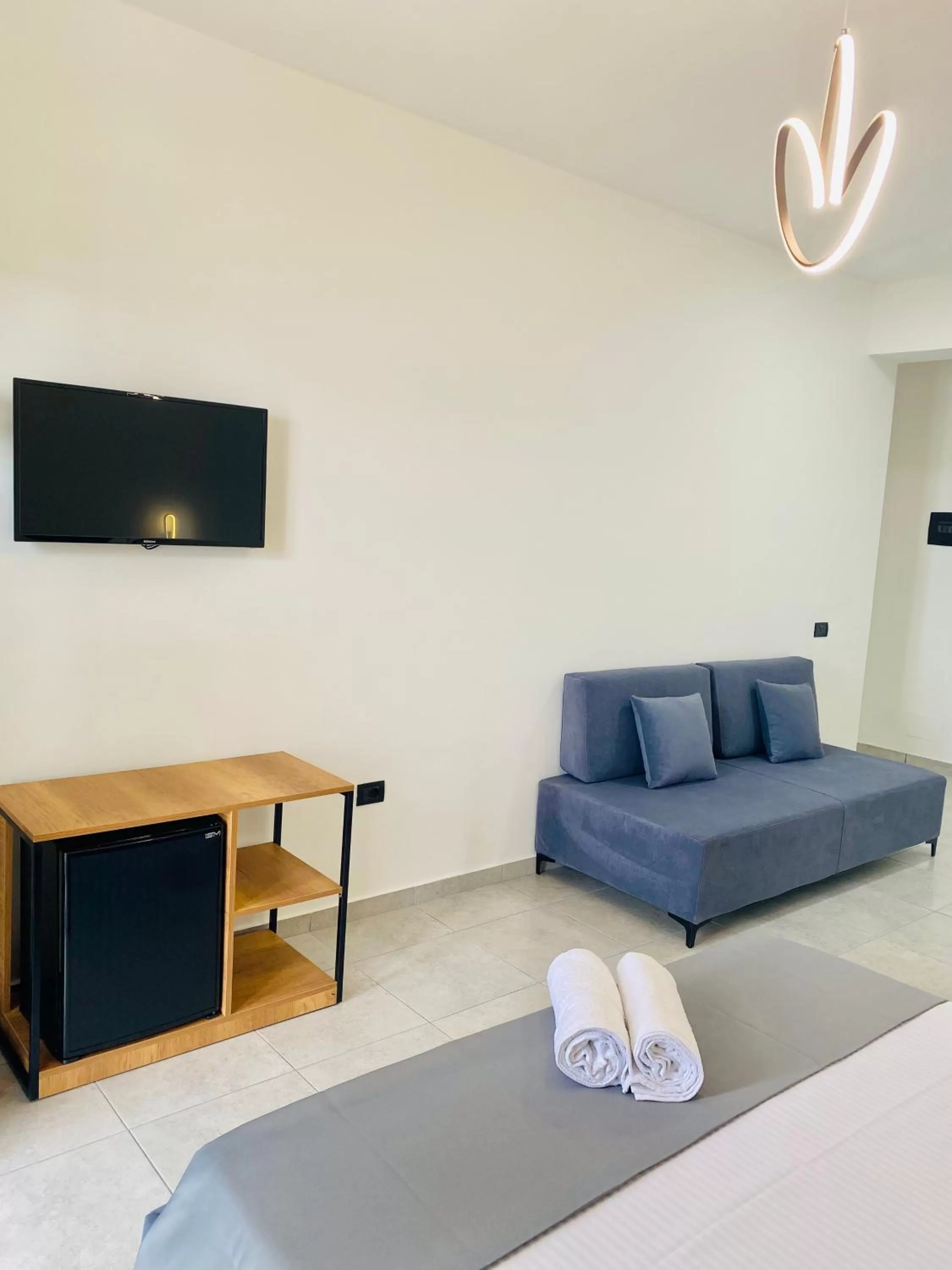 Communal lounge/ TV room in Maor Hotel