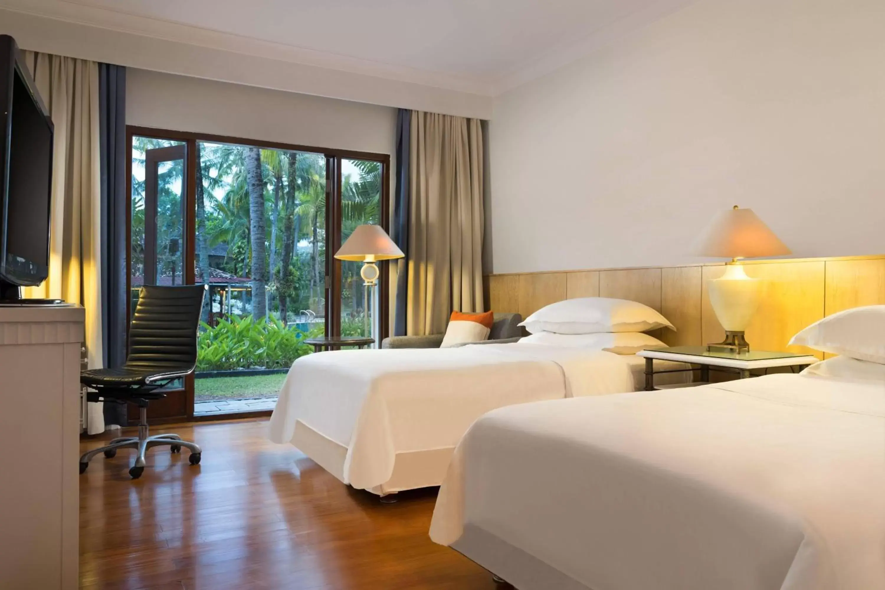 Deluxe Twin Room with Terrace and Garden Access - Non-Smoking in AKAR Hotels & Resort Lampung Deluxe Twin Room with Terrace and Garden Access - Non-Smoking in AKAR Hotels & Resort Lampung