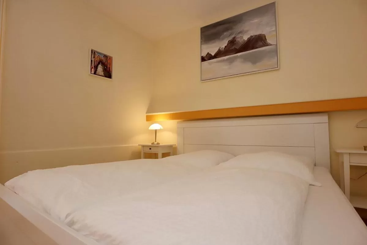 Bed in Hotel Sonnenhof Garni