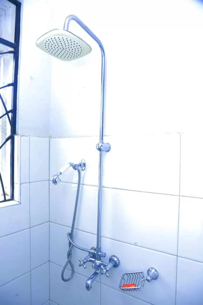 Shower in Karibu Namugongo