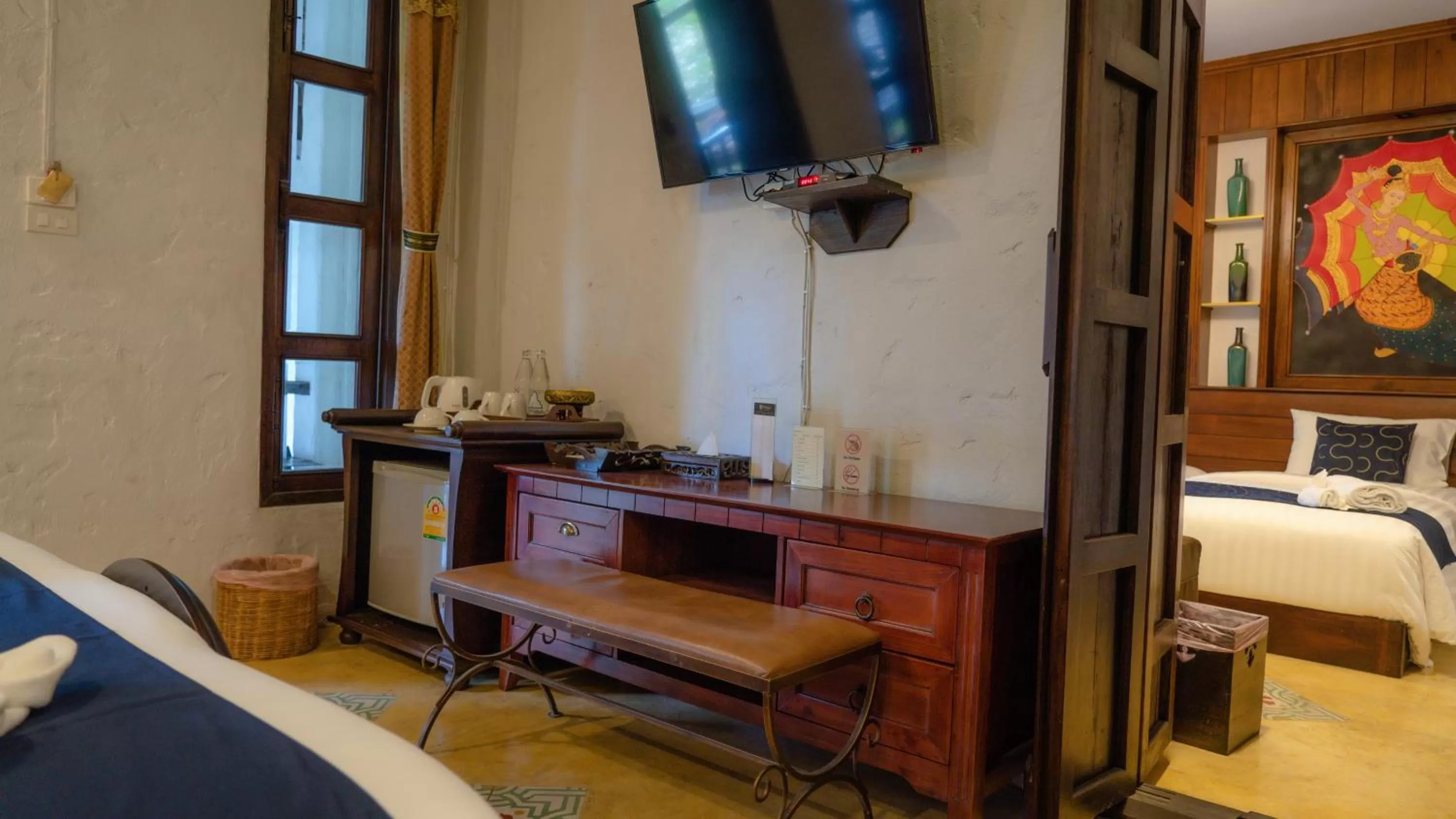 Photo of the whole room, TV/Entertainment Center in Cheva Gallery Boutique Hotel