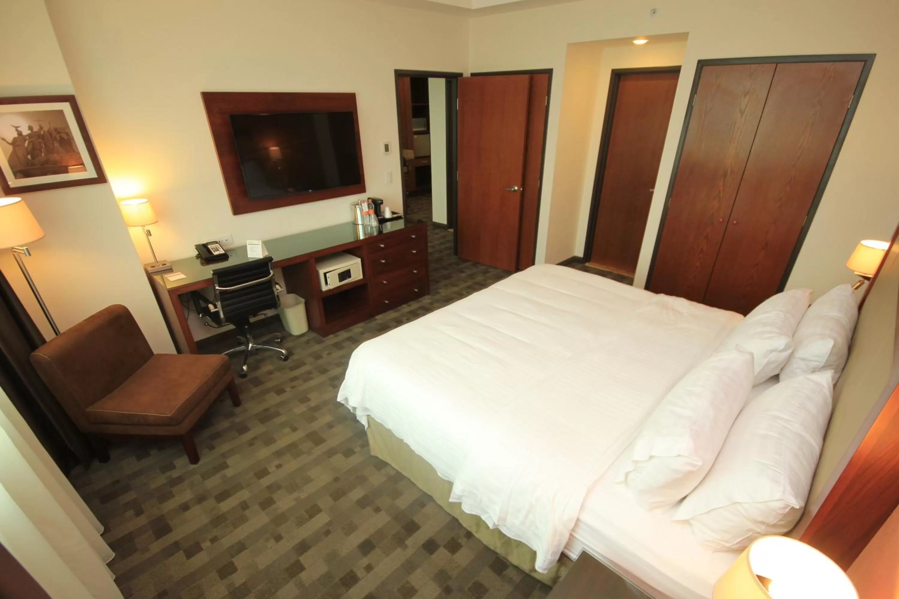 Photo of the whole room, Bed in Holiday Inn & Suites Plaza Mayor by IHG
