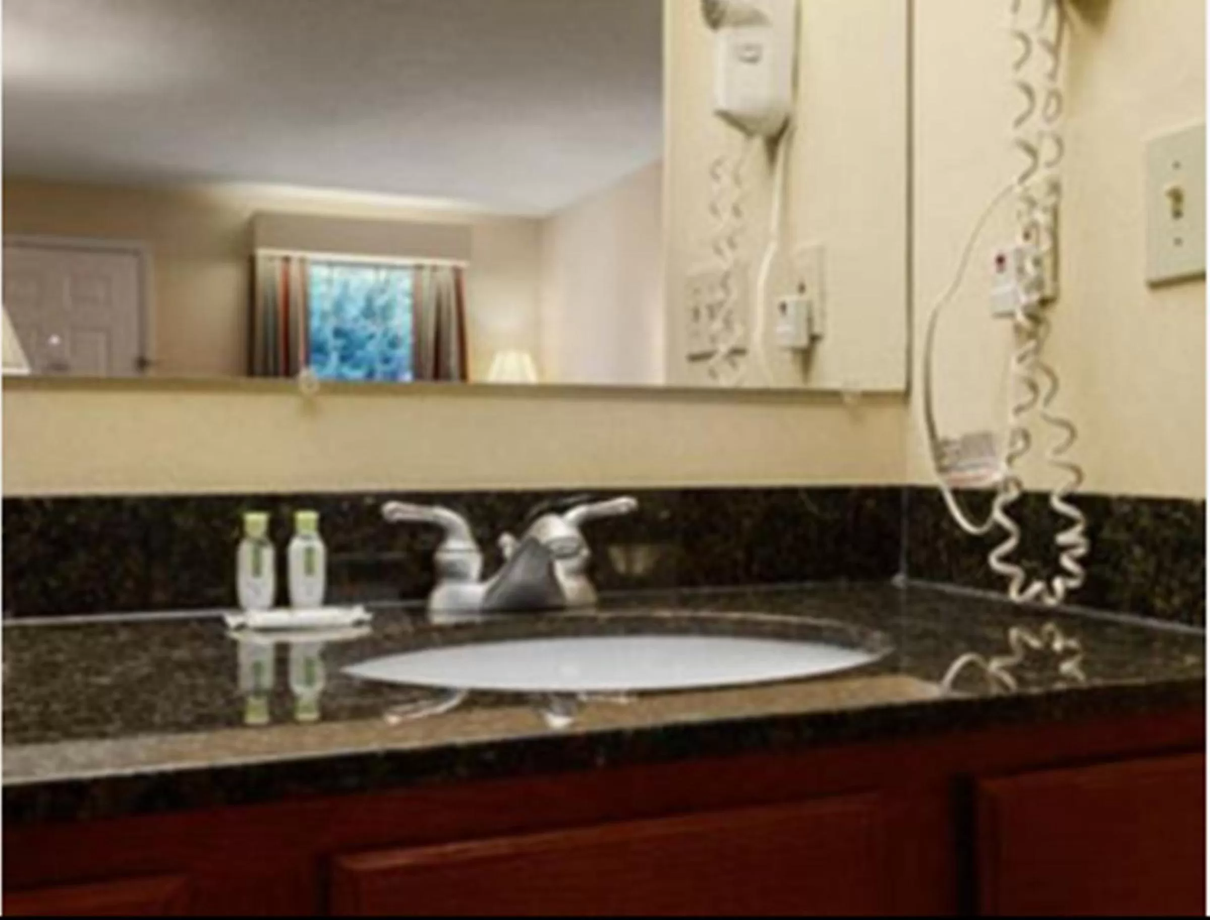 Bathroom in Baymont by Wyndham Sanford