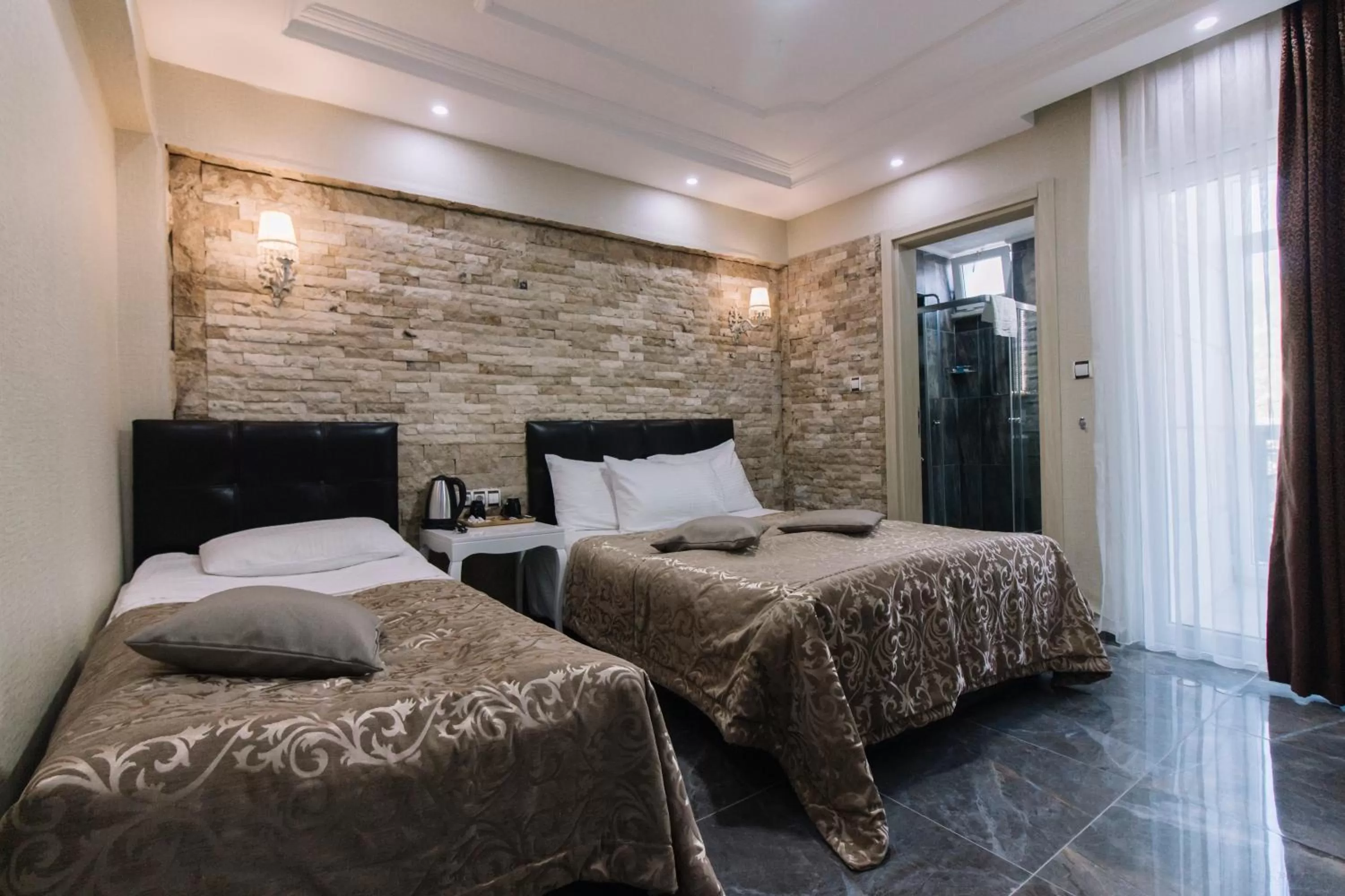 Bed in Melrose Pansiyon