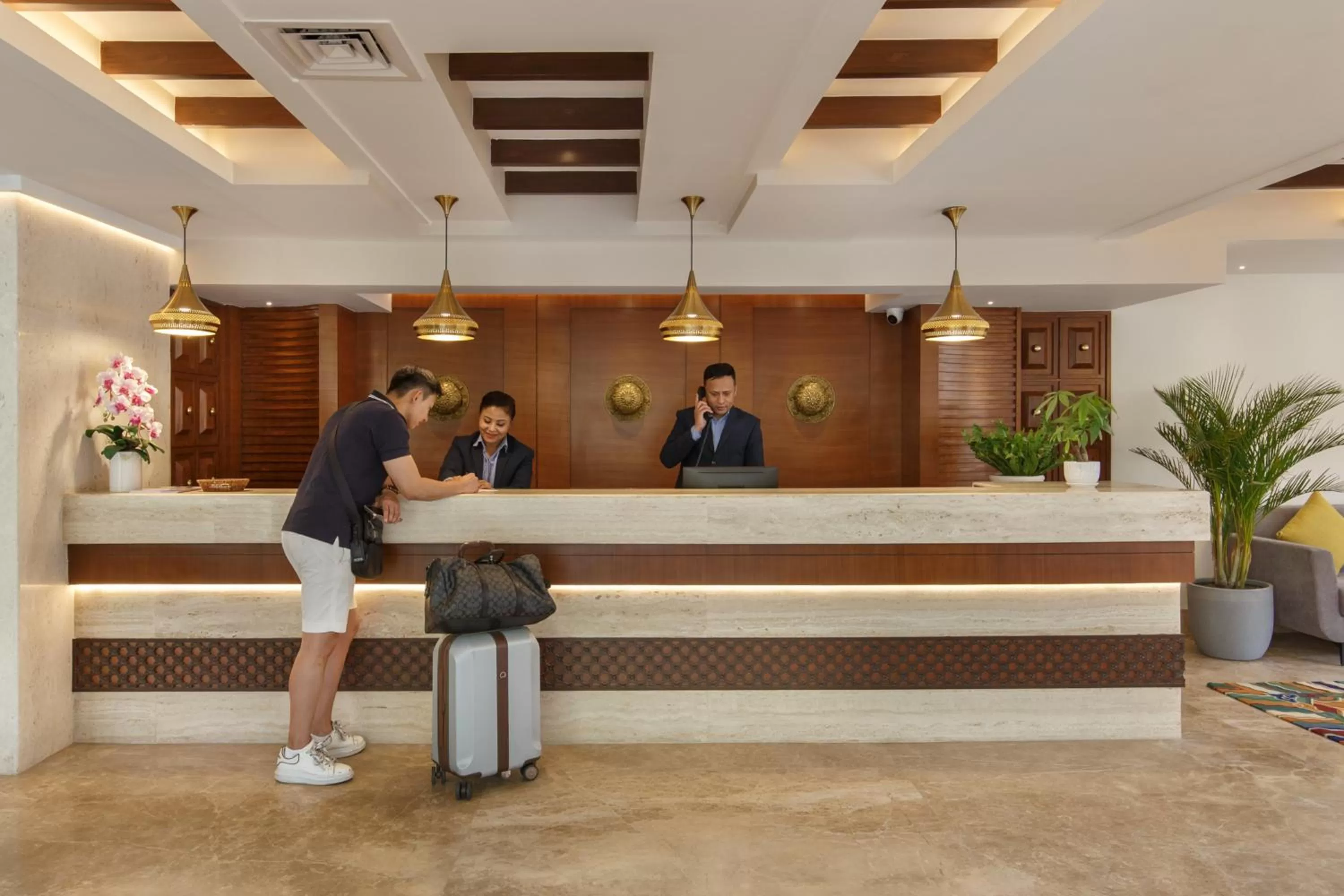 Staff in Hotel Thrive, A Tropical Courtyard