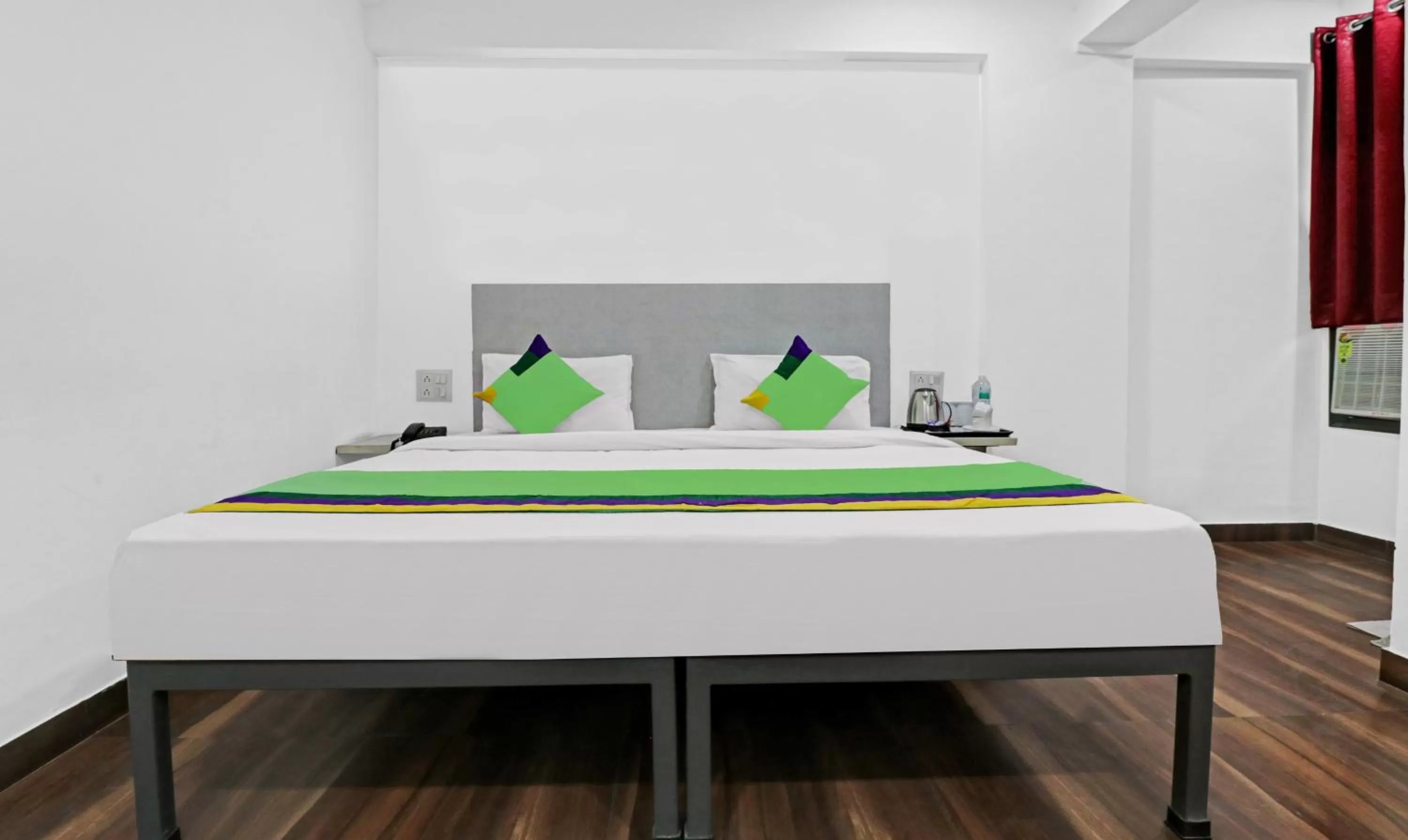 Bedroom, Bed in Treebo Grand Town House