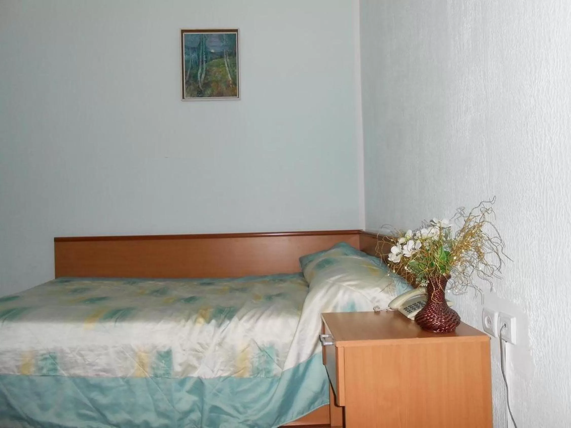 Bed in Zhibek Zholy Hotel