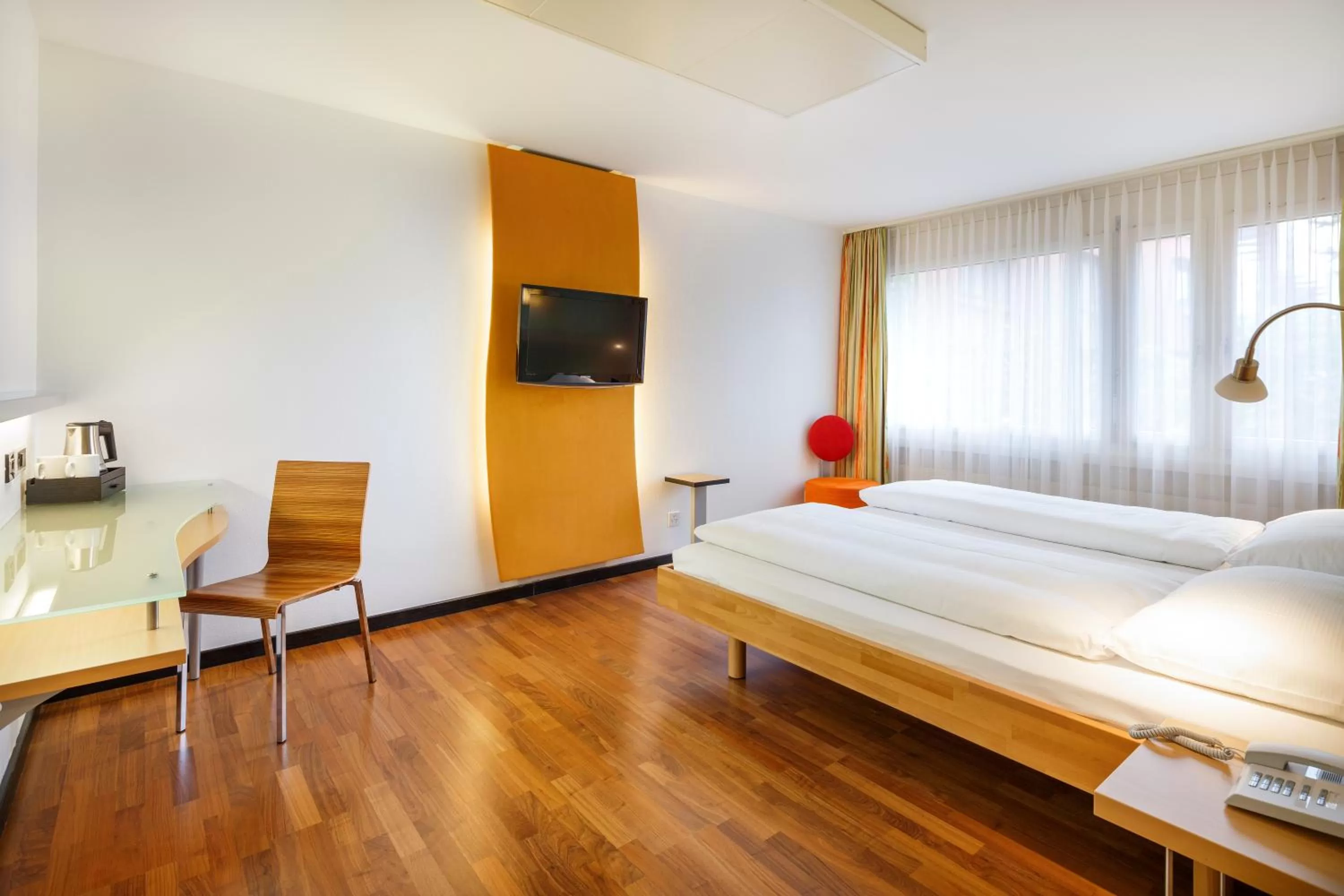 Photo of the whole room, Bed in Ramada by Wyndham Baden Hotel du Parc