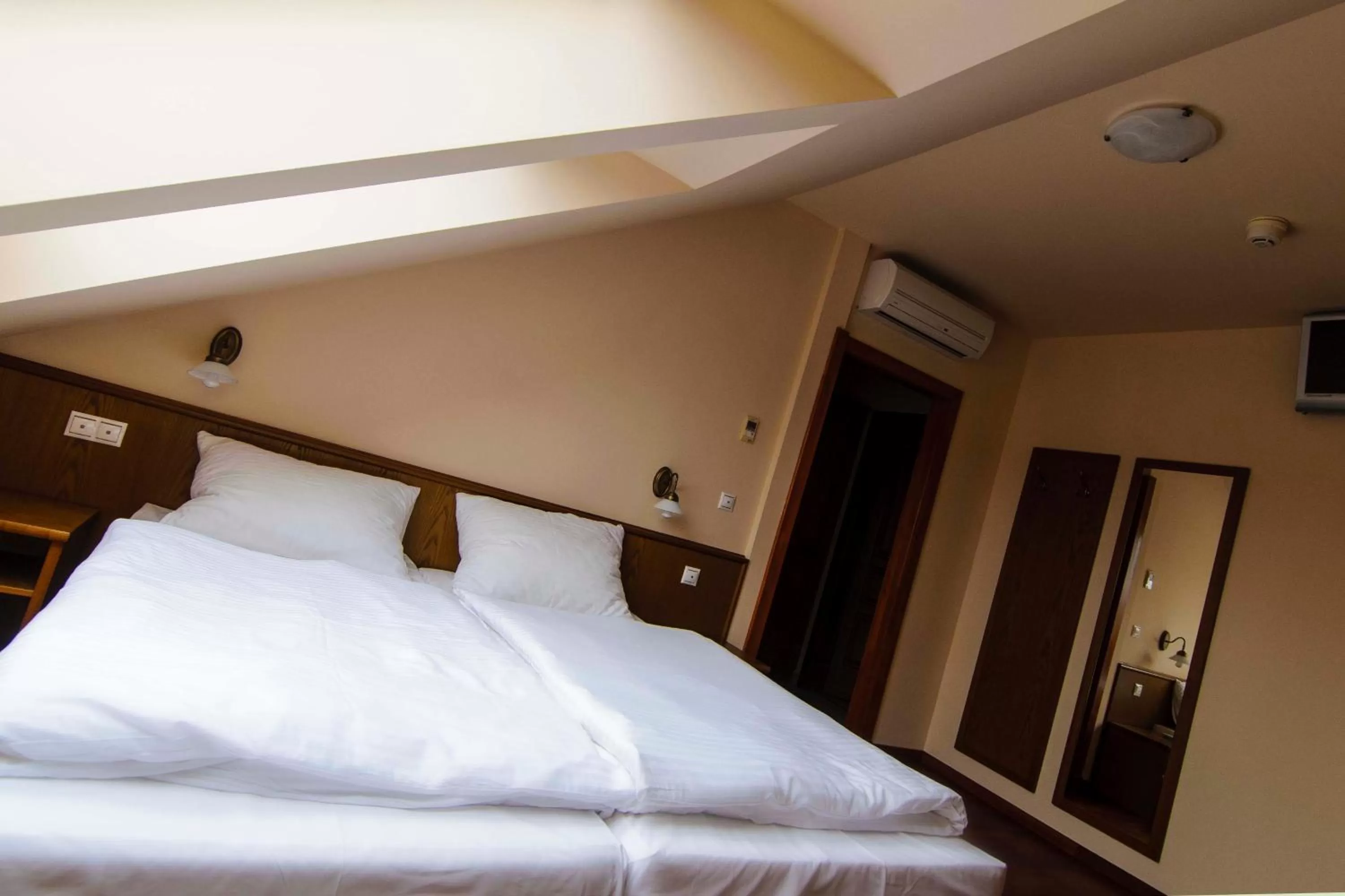 Bed in Publo Étterem és Panzió