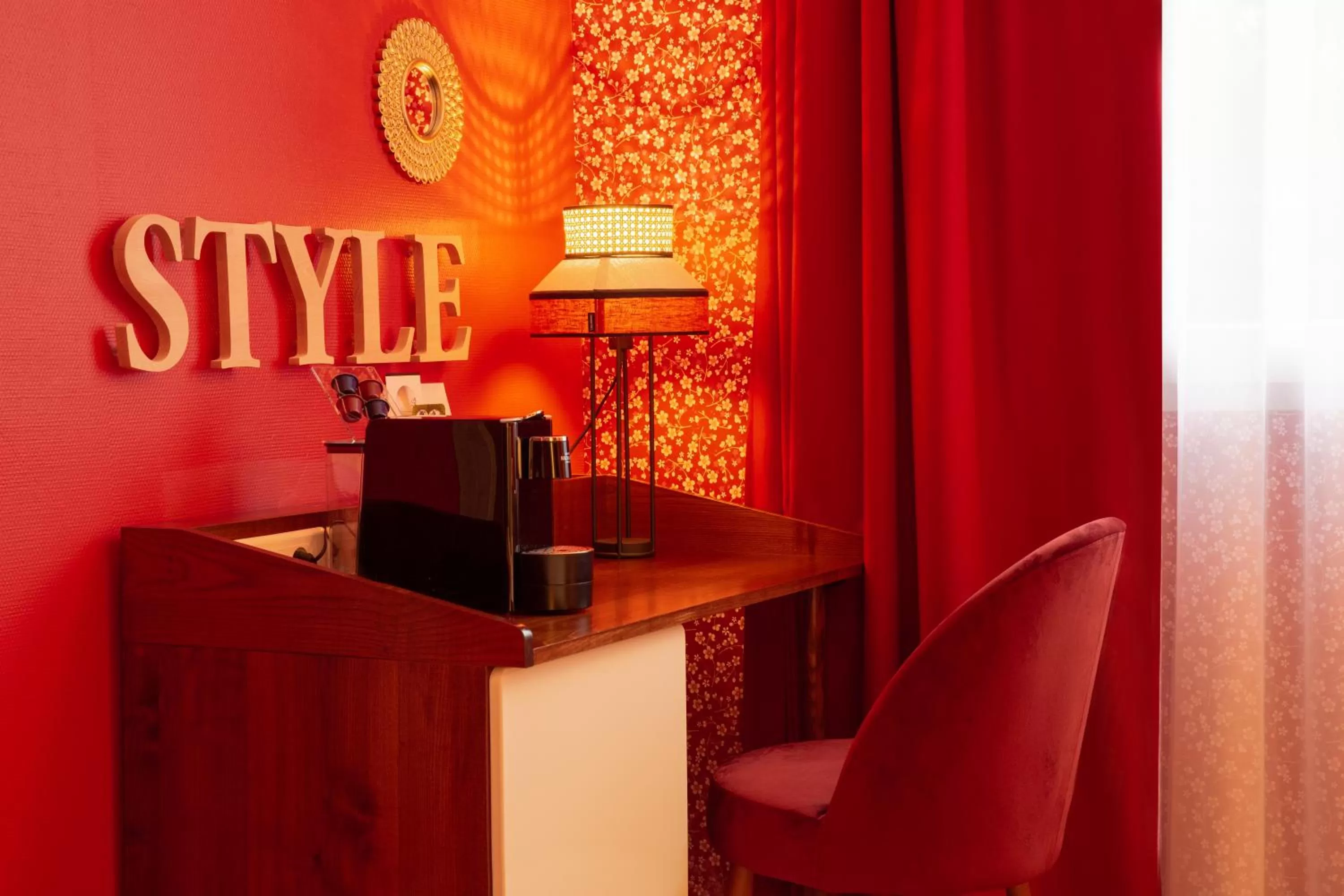 Seating area in Aiden by Best Western Paris Roissy CDG