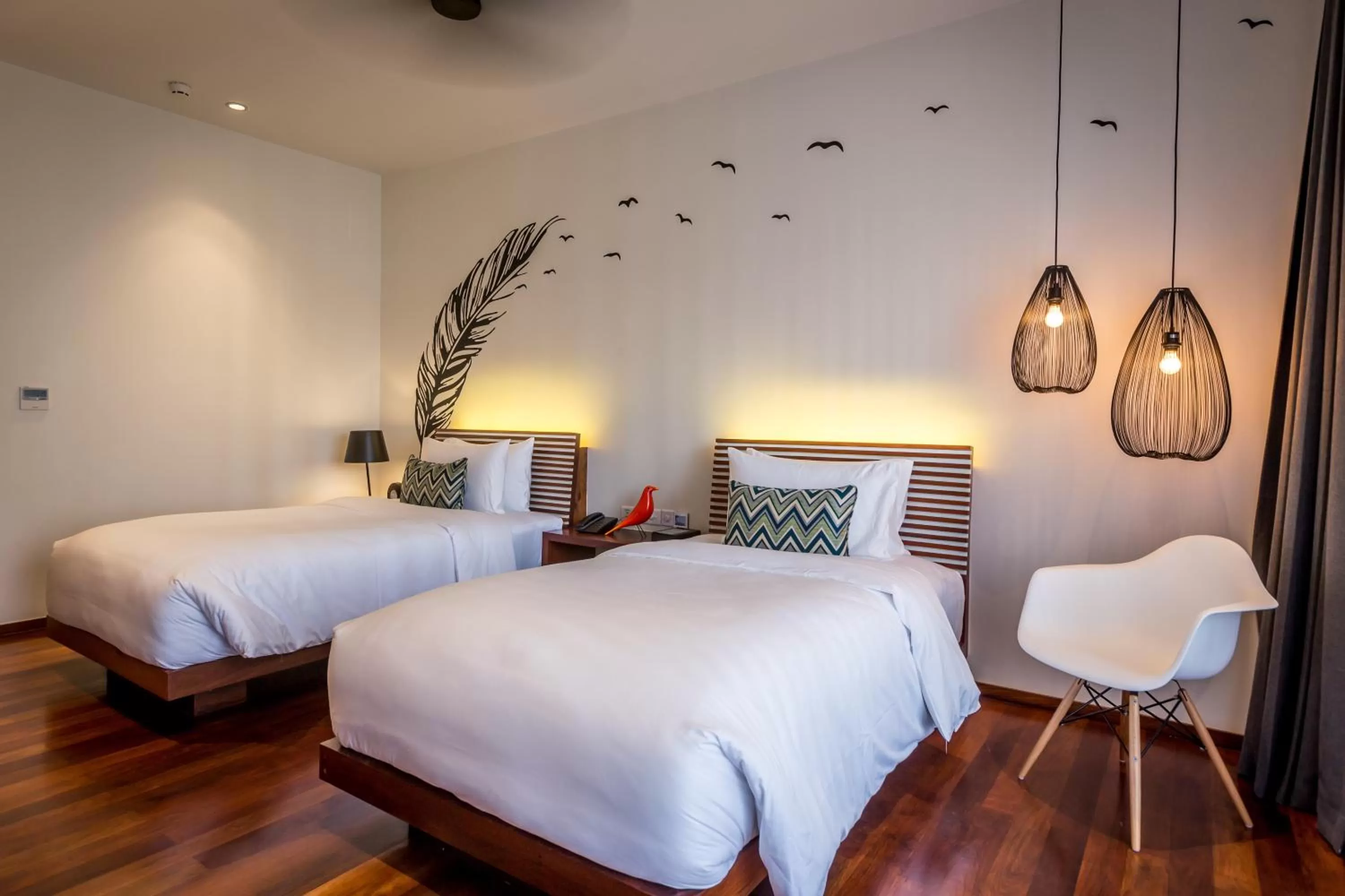 Bed in The Aviary Hotel