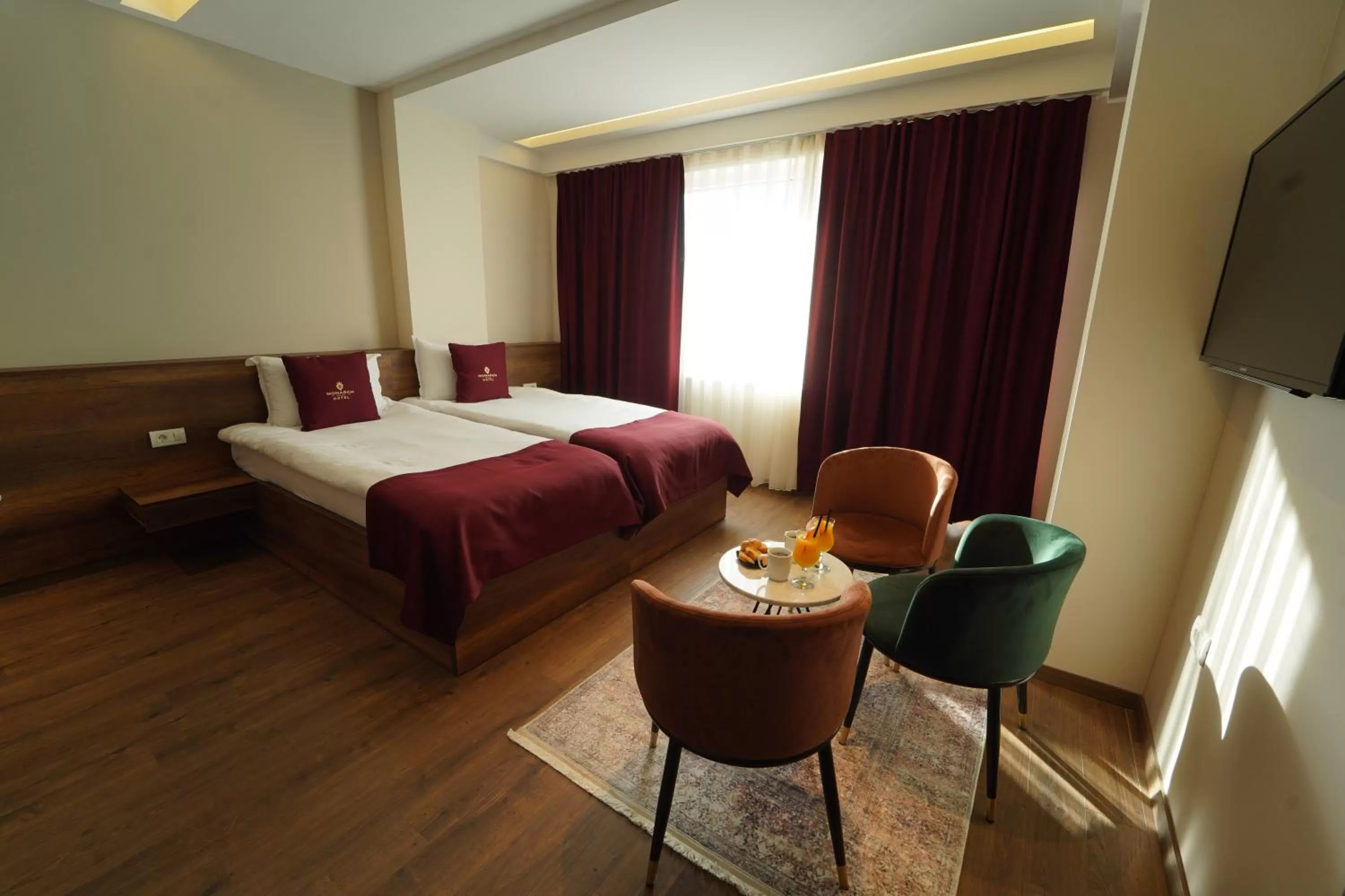 Bedroom in Monarch Hotel