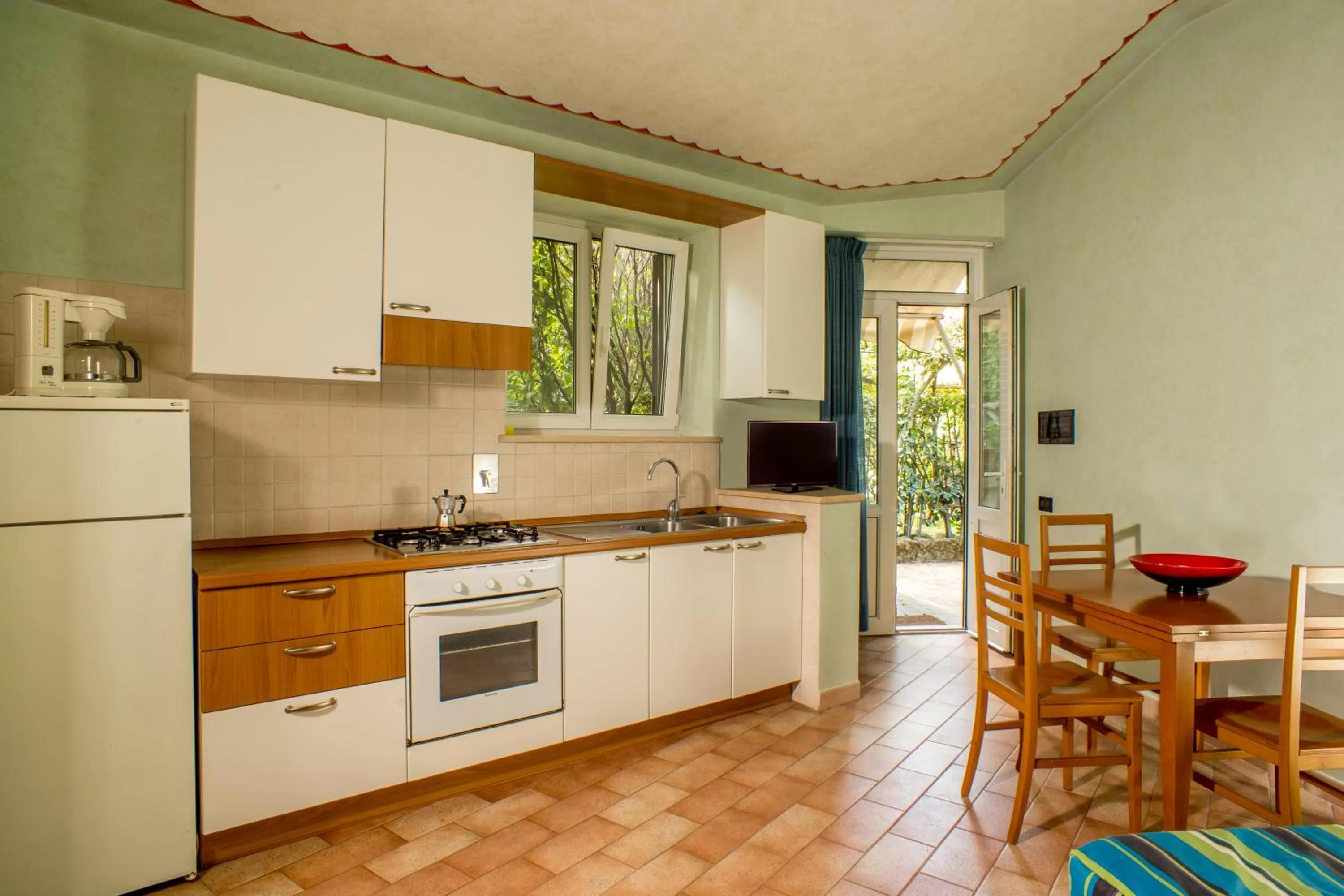 Kitchen or kitchenette in Residence Verdeborgo