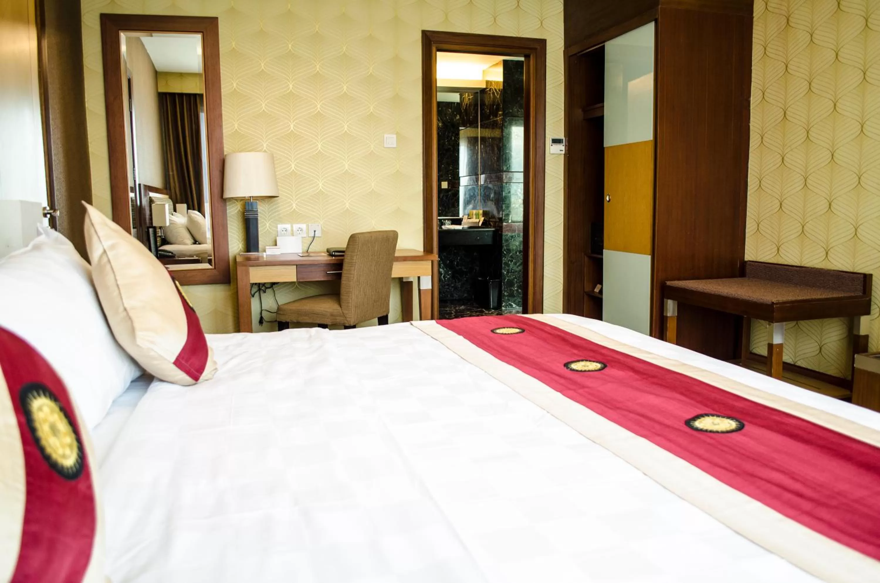 Bed in Swiss-Belhotel Maleosan Manado