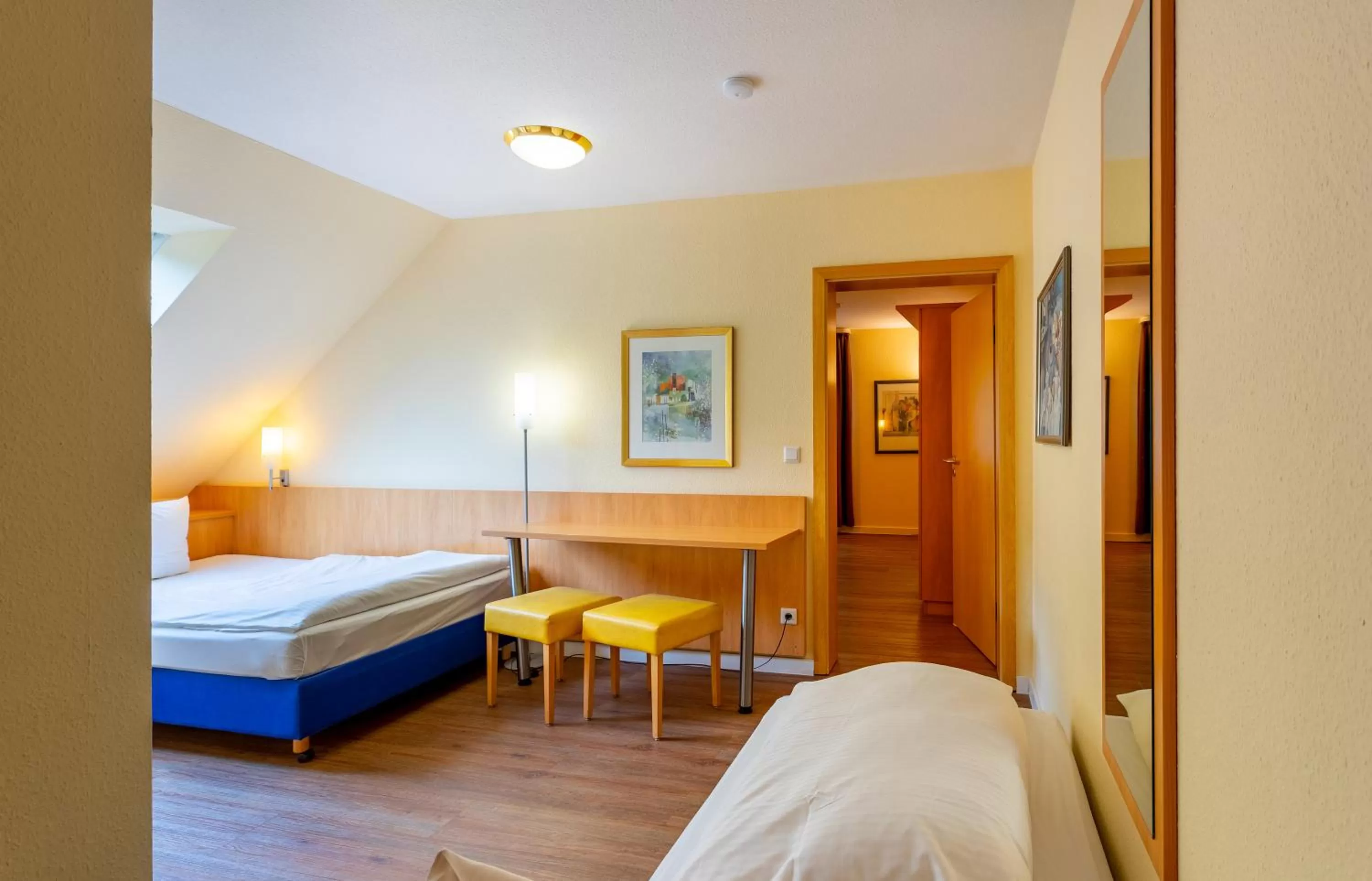 Photo of the whole room, Bed in Waldhotel Eskeshof